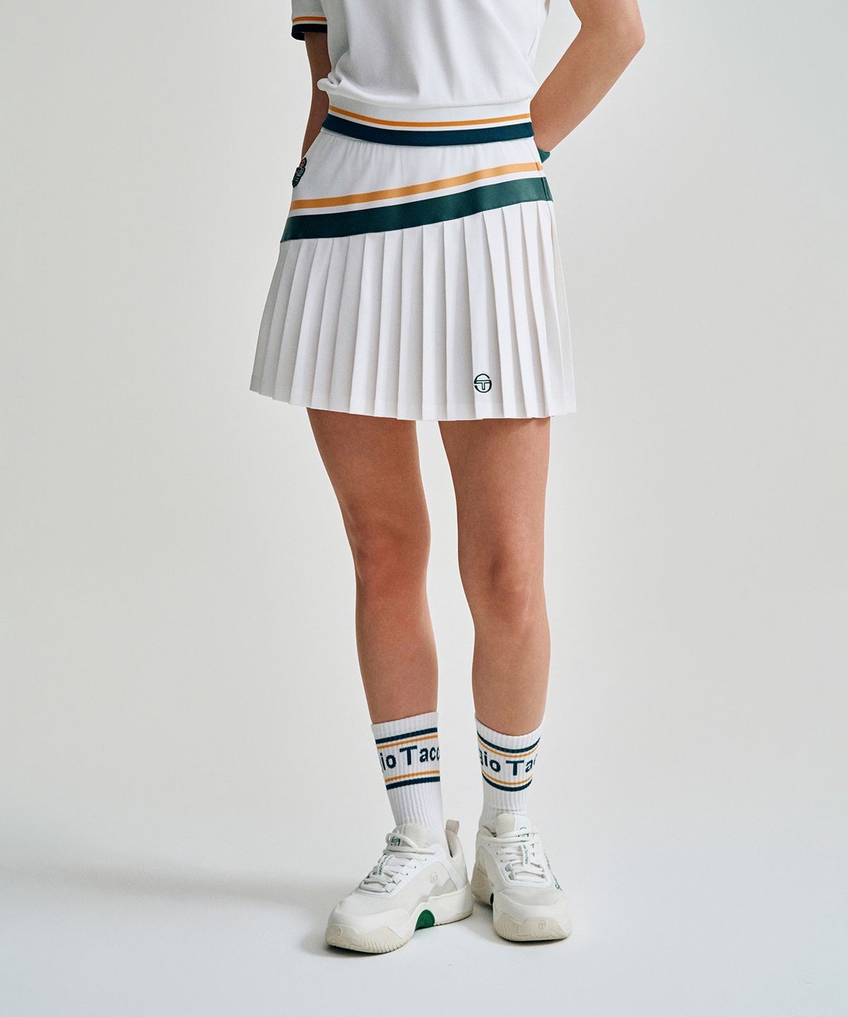 세르지오 타키니(SERGIO TACCHINI) W MC 스크래치 스태프 플리츠 스커트 (White)