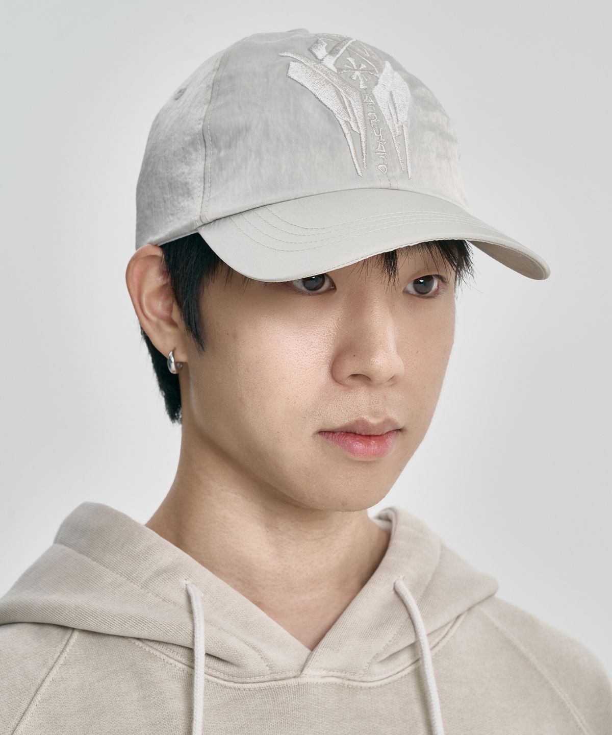 아조바이아조(AJOBYAJO) Cross Symbol Nylon Cap [IVORY]
