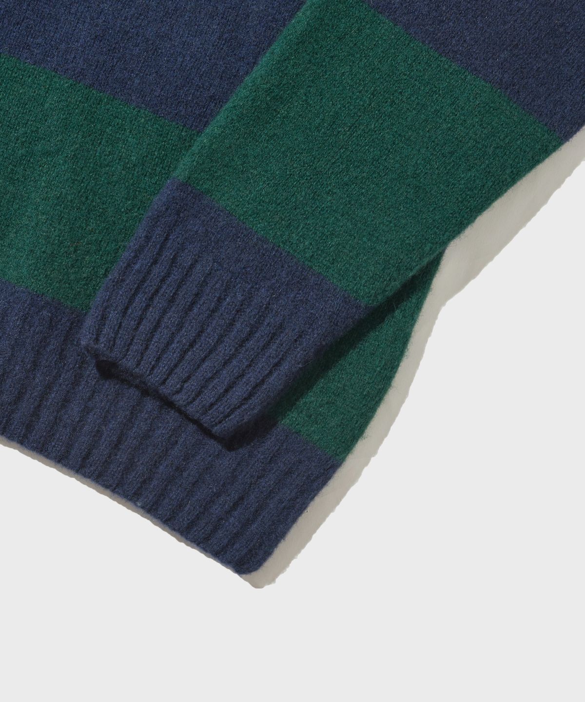 아웃스탠딩(OUTSTANDING) PURE WOOL WHOLEGARMENT STRIPE KNIT_GREEN/BLUE