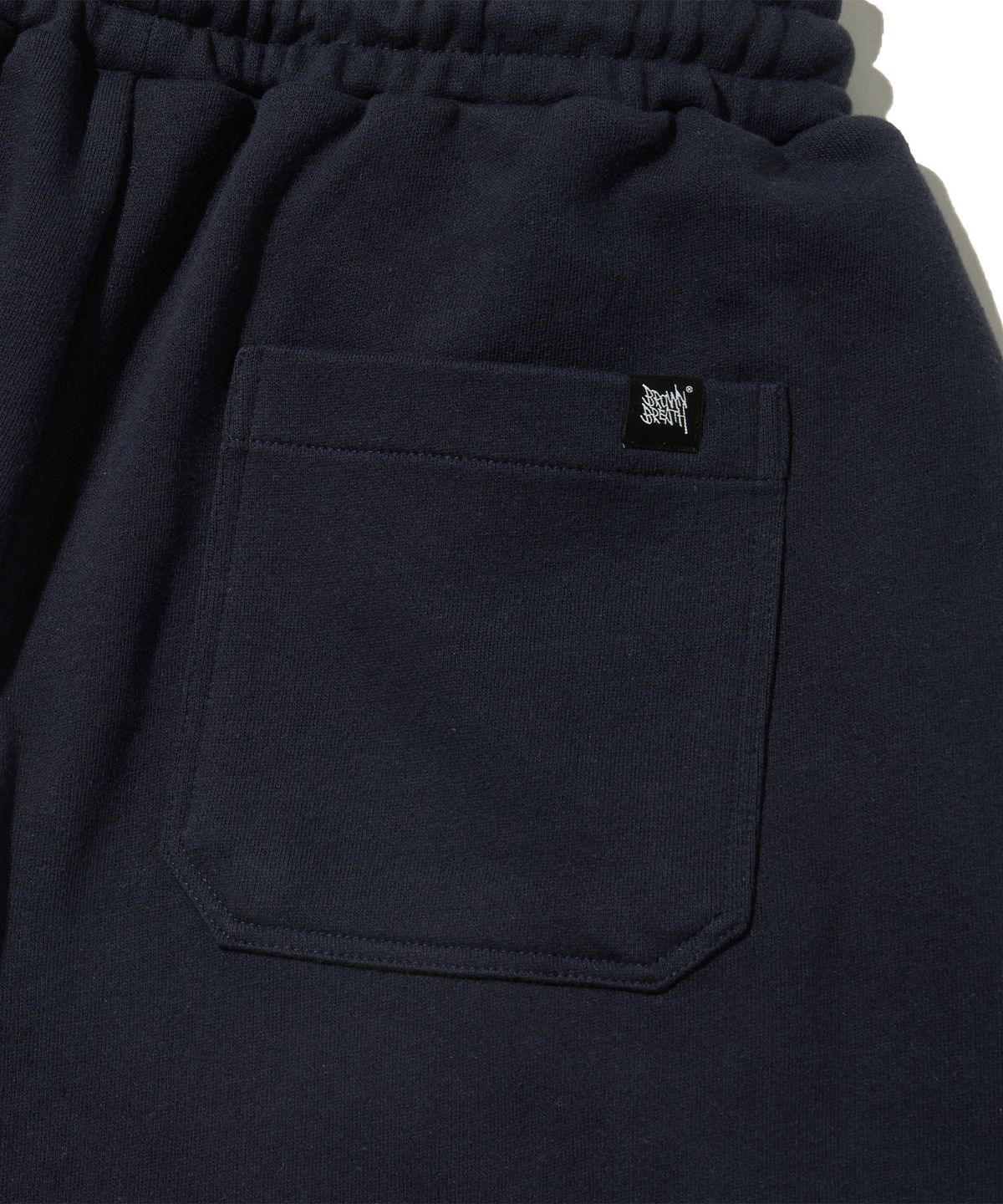 브라운브레스(BROWNBREATH) TWO TUCK WIDE TAG SWEAT PANTS - NAVY