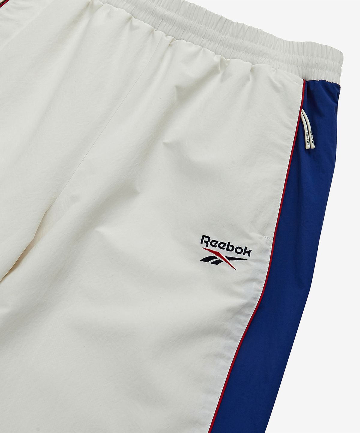 리복(REEBOK) 레전드 2WAY 웜업 팬츠 - 화이트