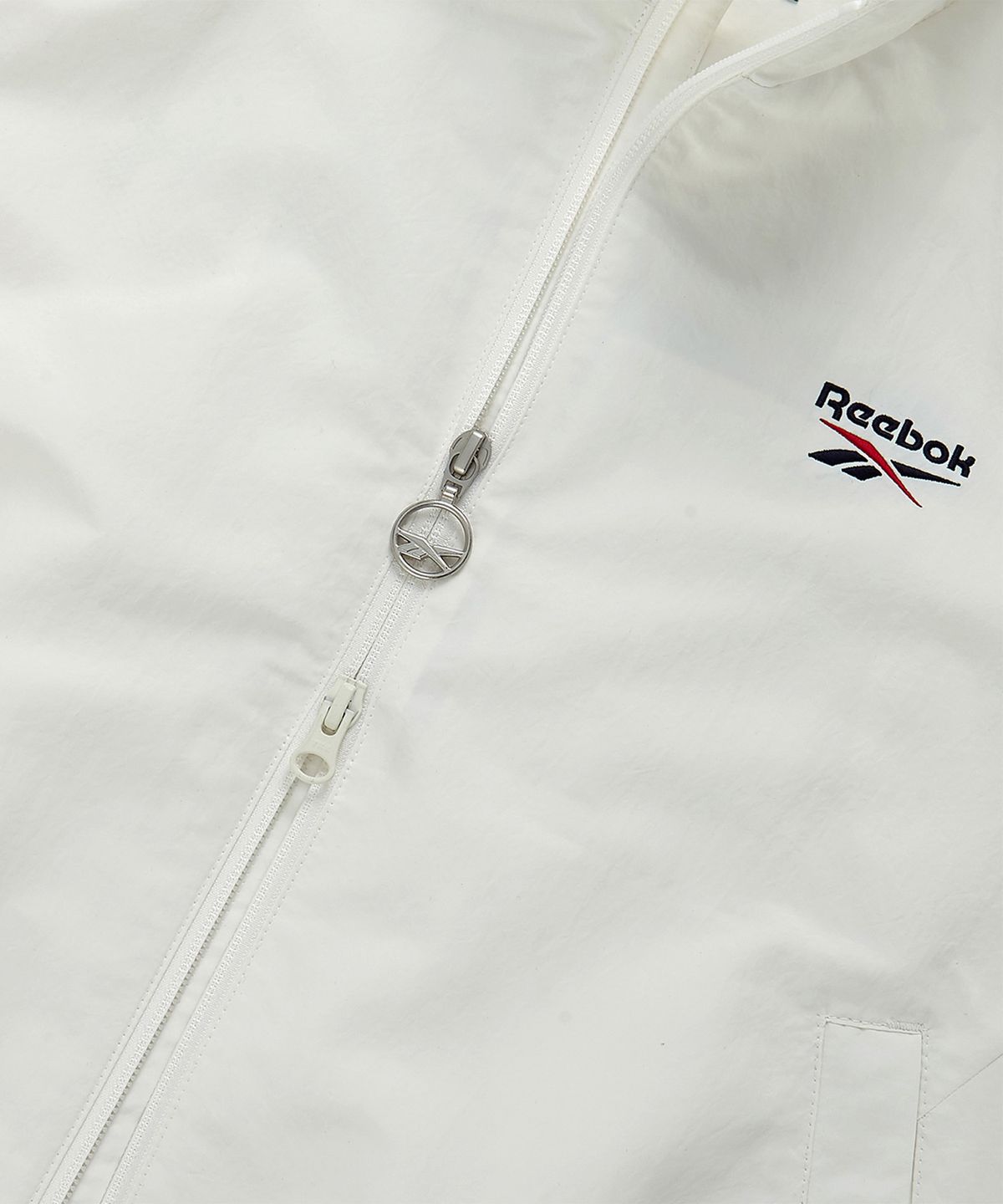 리복(REEBOK) 레전드 웜업 크롭 윈드 브레이커 (W)  - 화이트
