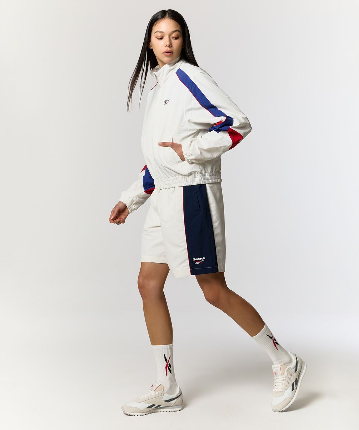 리복(REEBOK) 레전드 웜업 크롭 윈드 브레이커 (W)  - 화이트