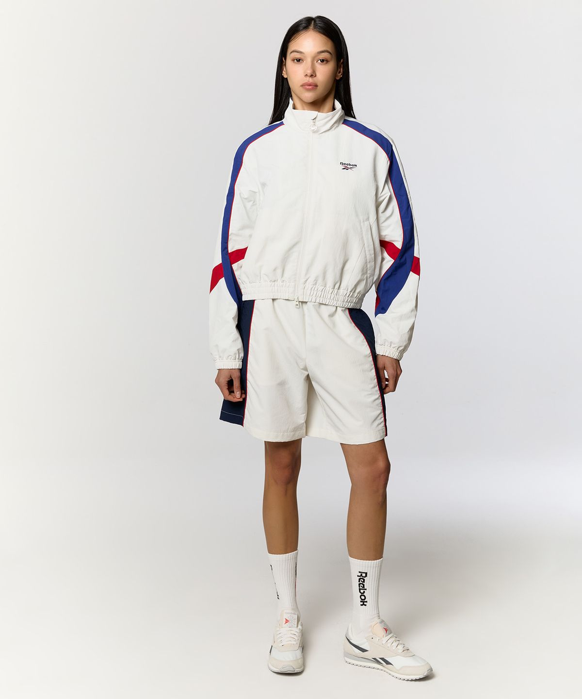 리복(REEBOK) 레전드 웜업 크롭 윈드 브레이커 (W)  - 화이트