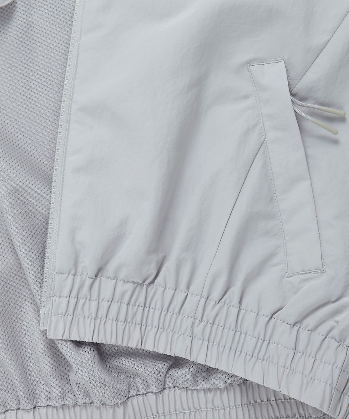 리복(REEBOK) 레전드 웜업 크롭 윈드 브레이커 (W)  - 그레이