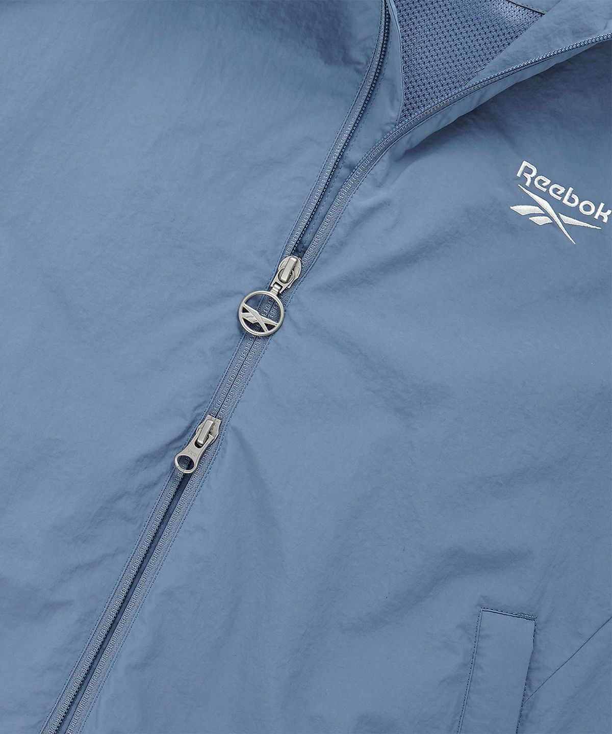 리복(REEBOK) 레전드 웜업 윈드 브레이커 - 블루