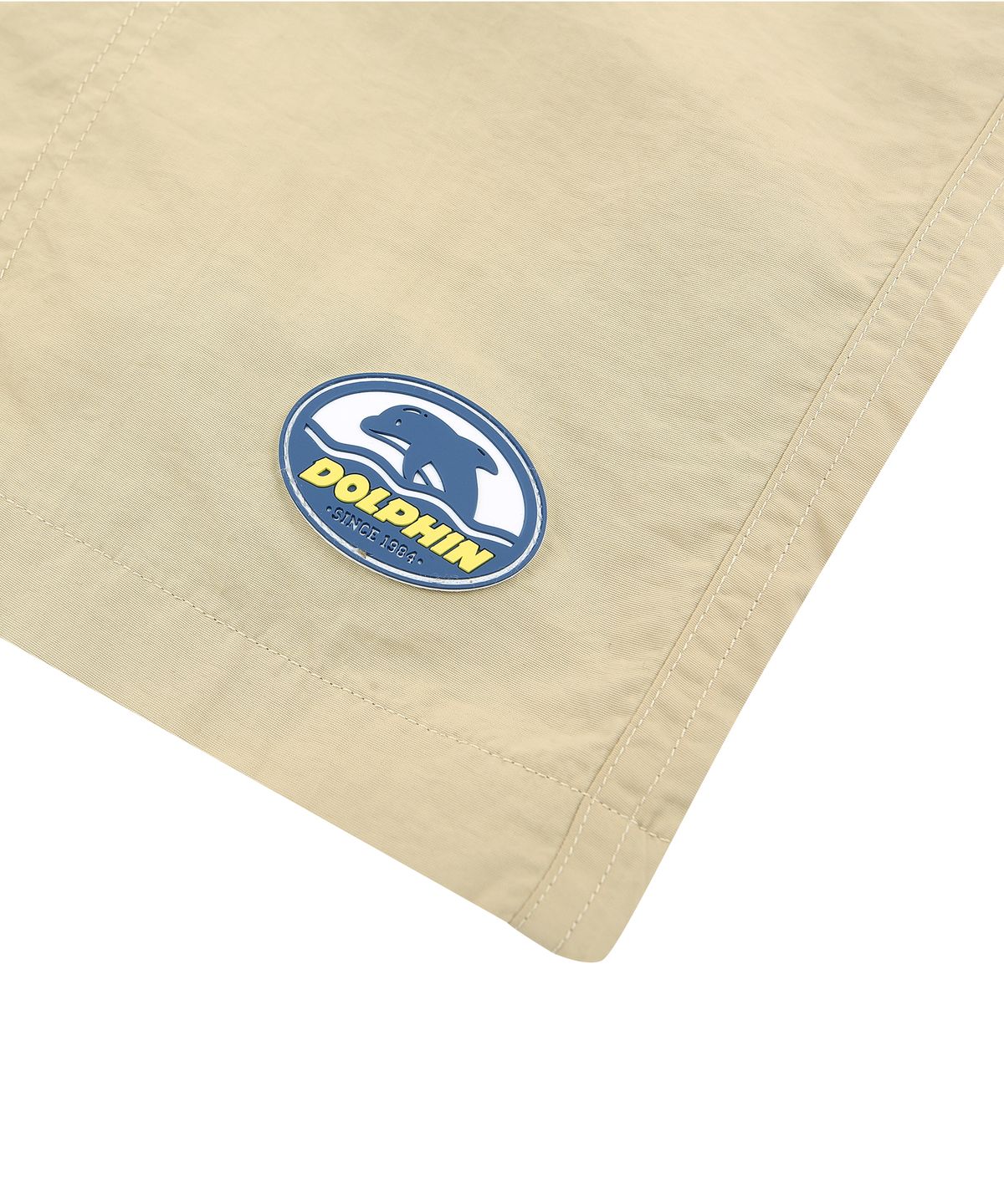 돌핀웨이브어패럴(DOLPHIN WAVE APPAREL) 돌핀 실리콘와펜 루즈핏 타슬란 반바지 베이지