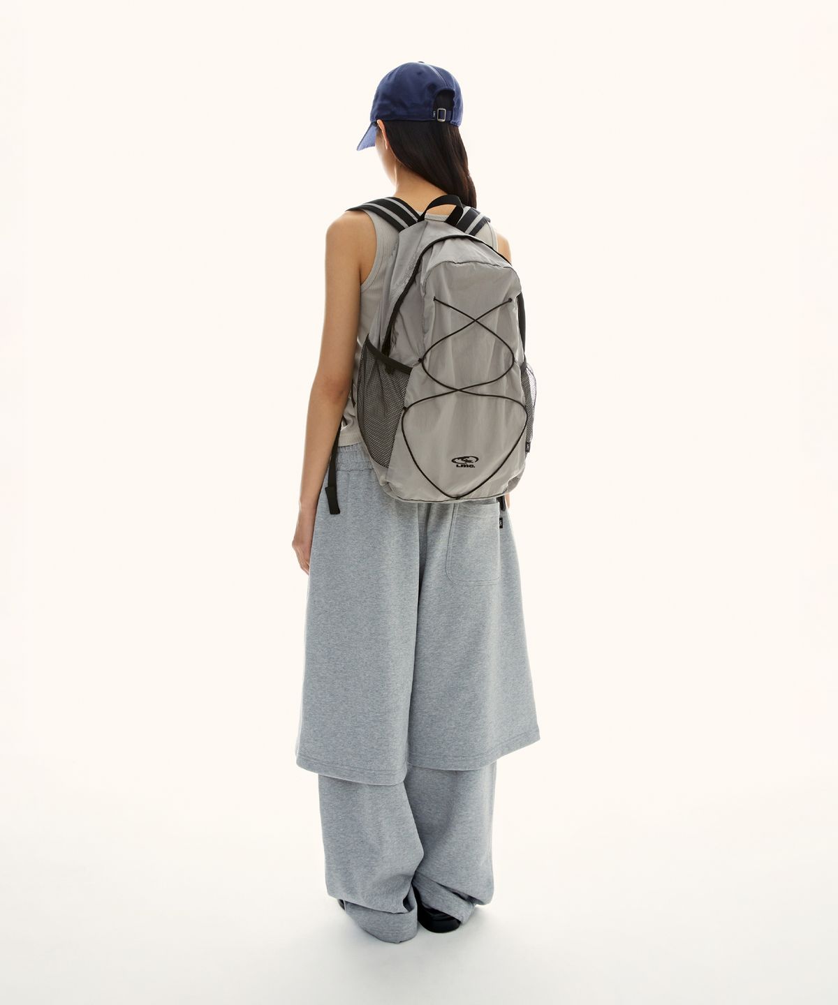 엘엠씨(LMC) OVAL GLOBE STRING BACKPACK gray