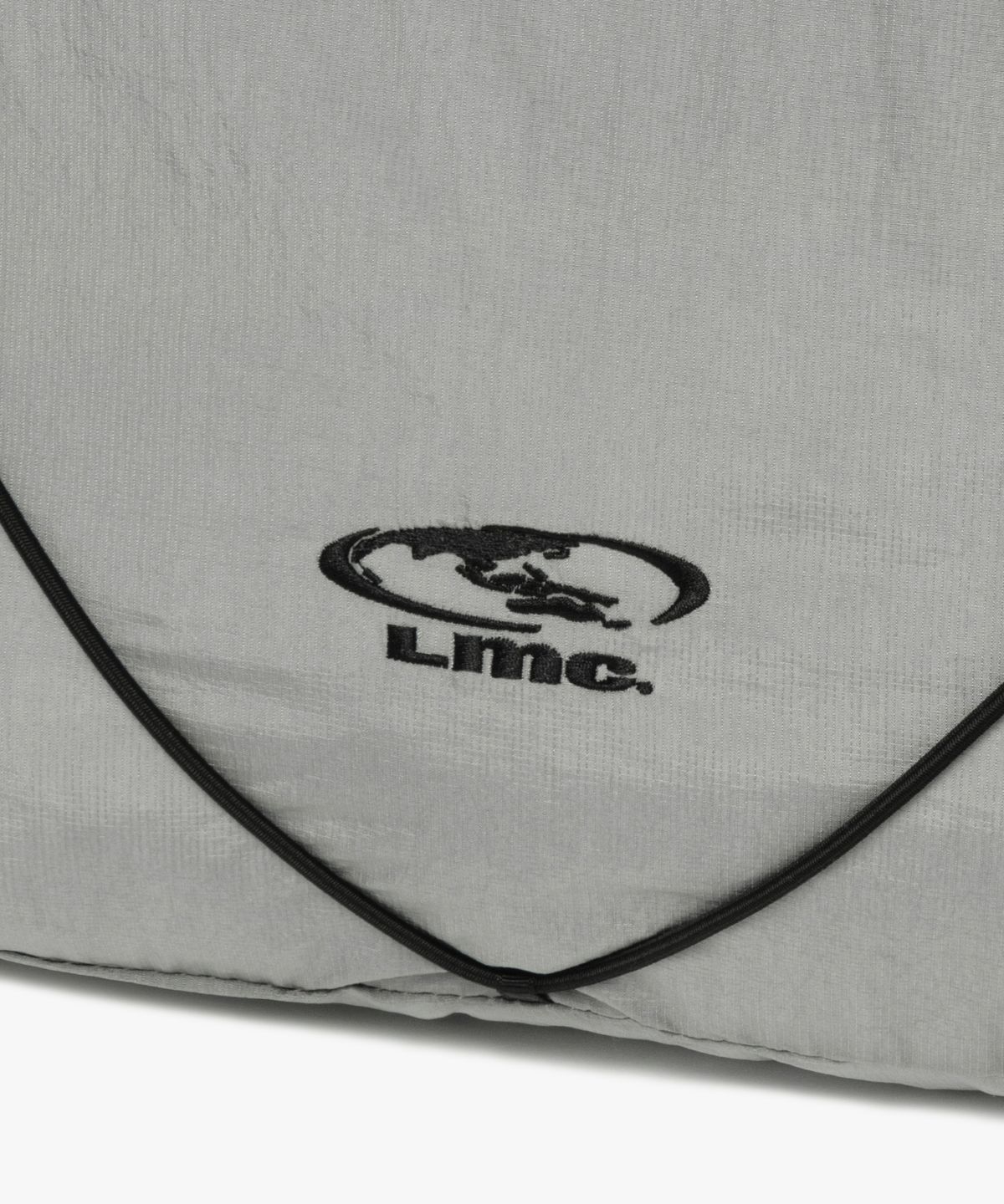 엘엠씨(LMC) OVAL GLOBE STRING BACKPACK gray