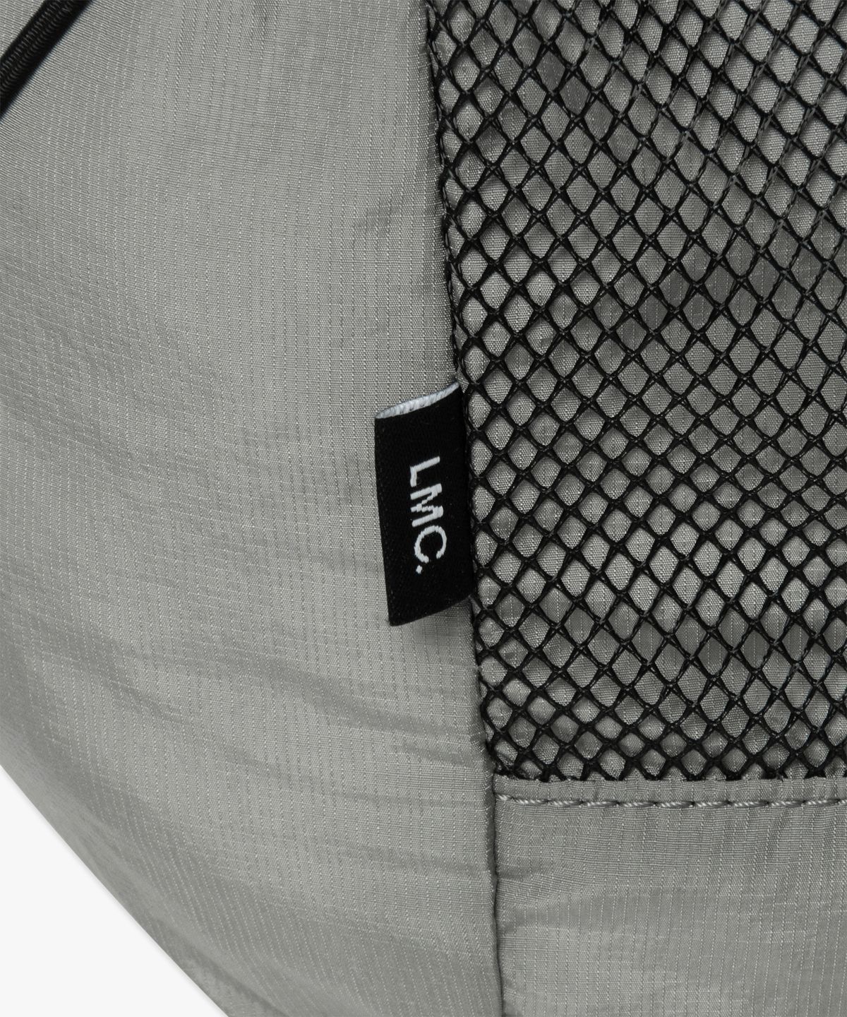 엘엠씨(LMC) OVAL GLOBE STRING BACKPACK gray