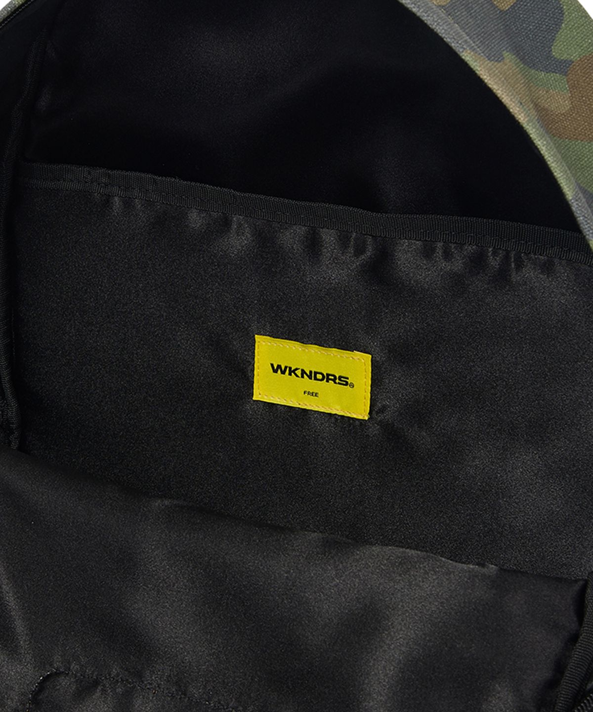 위캔더스(WKNDRS) GRAFFITI LOGO BACKPACK (CAMO)