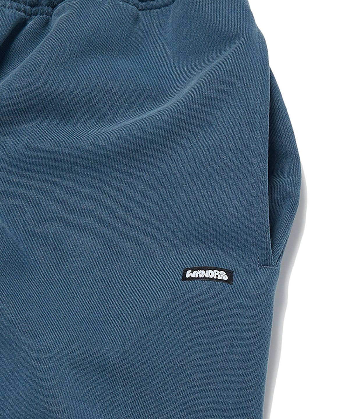 위캔더스(WKNDRS) PIGMENT DYED SWEAT PANTS (BLUE)