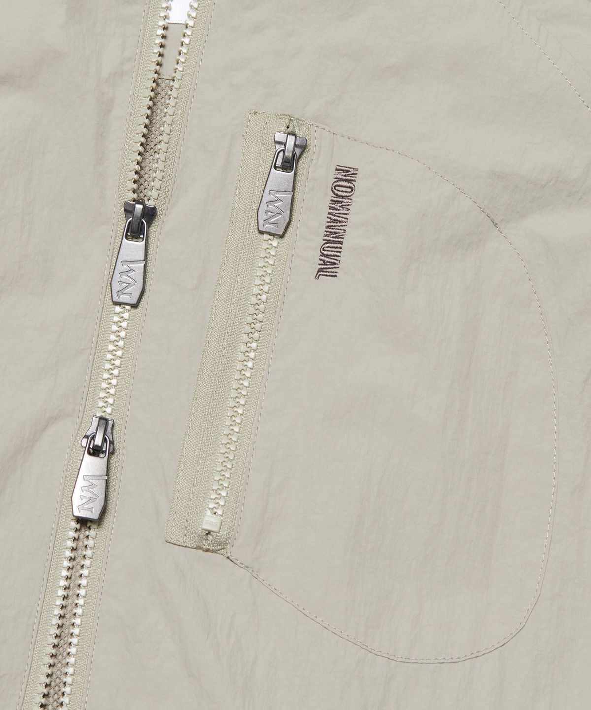 노매뉴얼(NOMANUAL) SAIL WIND SHELL - SAND GRAY