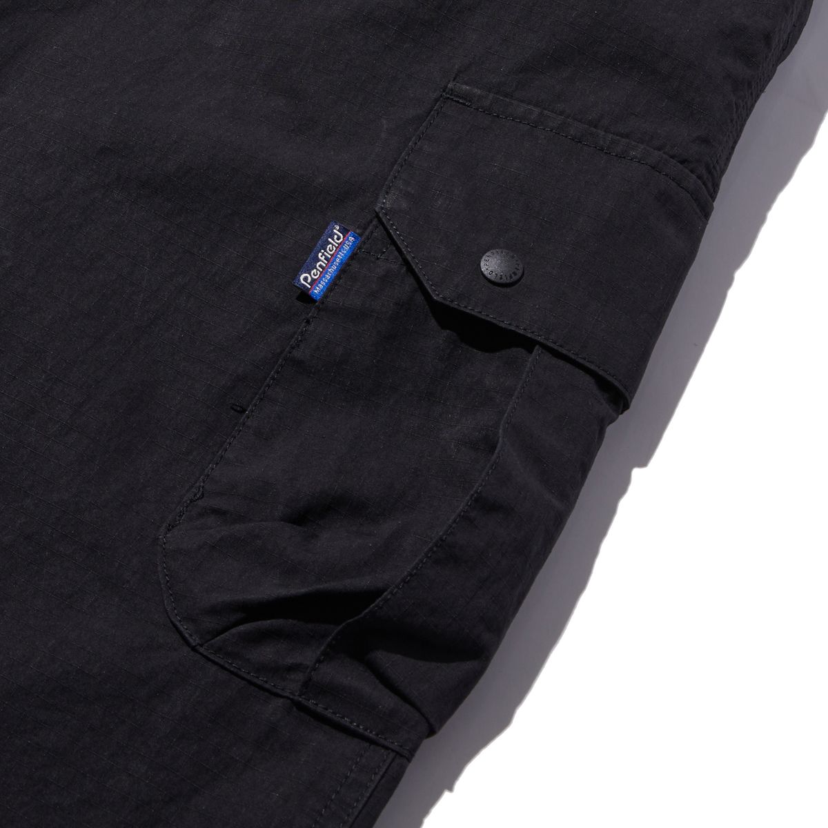 펜필드(PENFIELD) CN 페이디드 H라인 카고 스커트 블랙_FR2WS71F