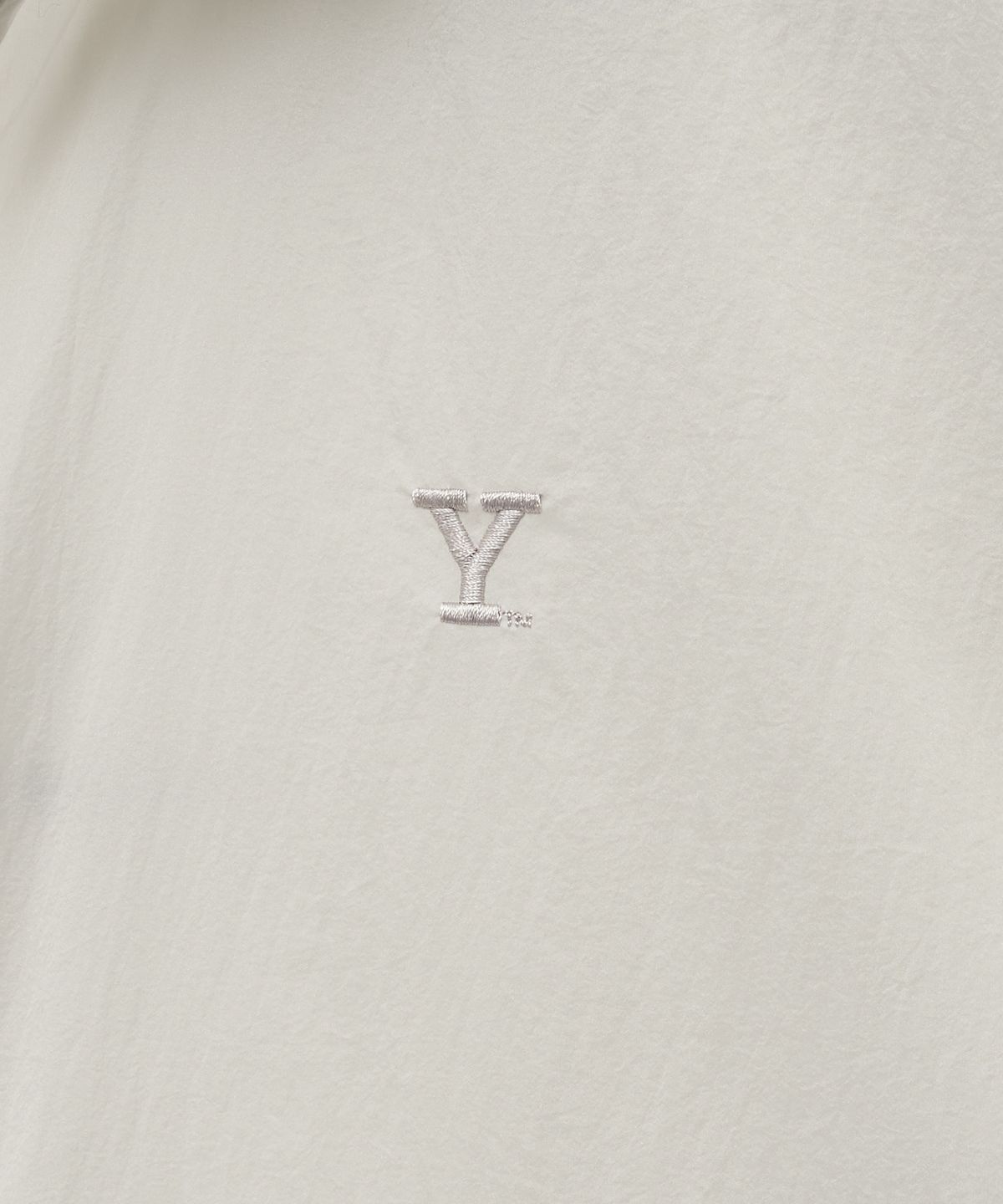 예일(YALE) 나일론 하프 스트링 재킷_아이보리