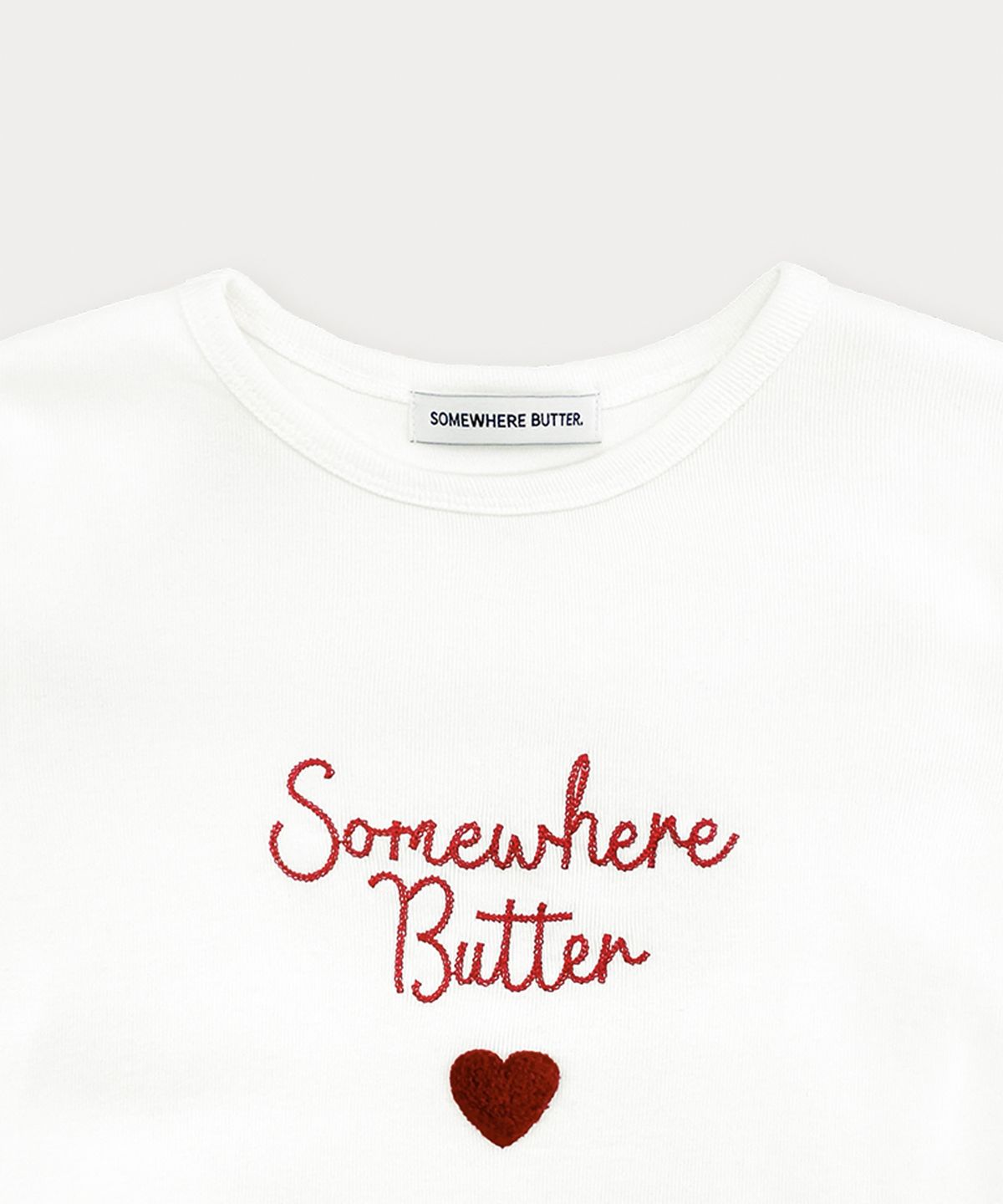 썸웨어버터(SOMEWHEREBUTTER) Boucle Heart Logo Top - Ivory