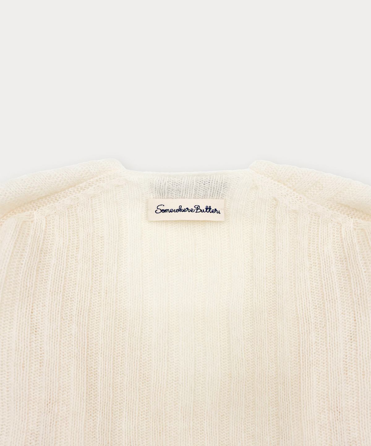 썸웨어버터(SOMEWHEREBUTTER) Veggie V-Neck Knit - Ivory