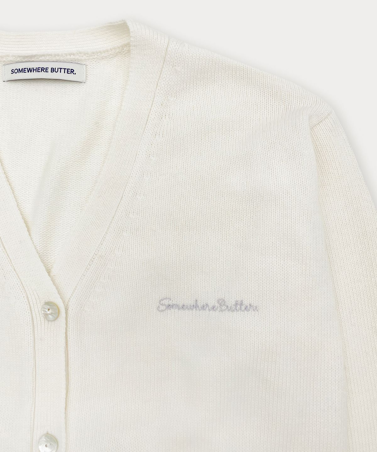 썸웨어버터(SOMEWHEREBUTTER) Camilla V-Neck Cardigan - Ivory