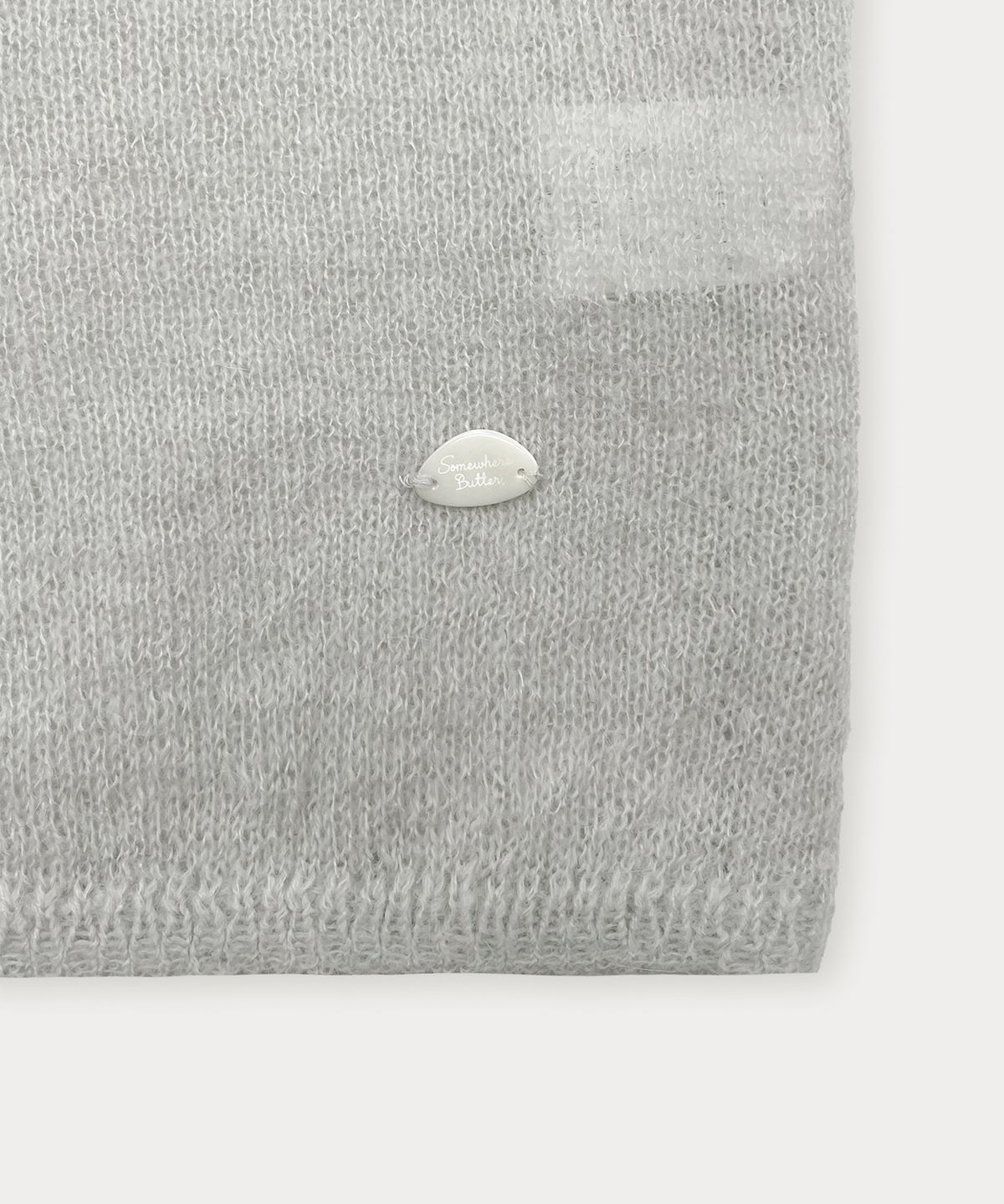 썸웨어버터(SOMEWHEREBUTTER) Pendant See-Through Half Knit - Light Grey