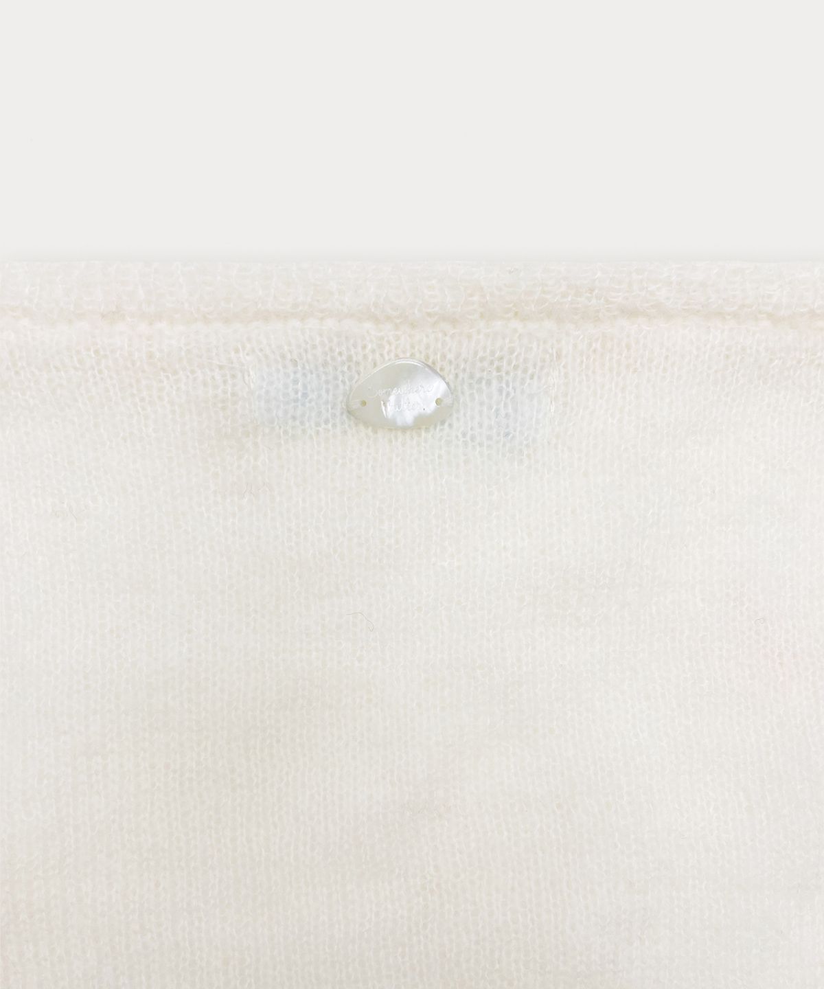 썸웨어버터(SOMEWHEREBUTTER) See-Through Knit Bustier Top - Ivory