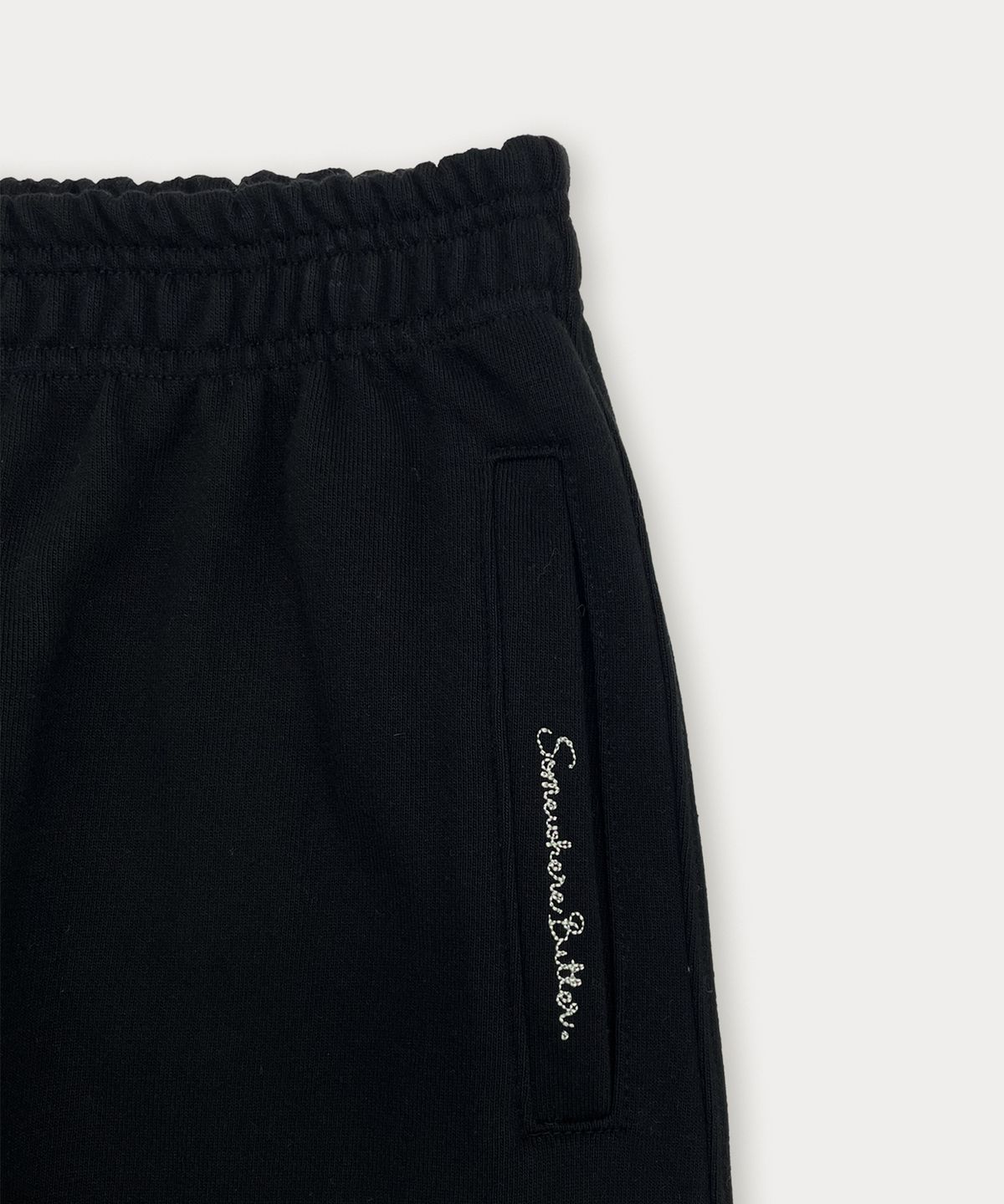 썸웨어버터(SOMEWHEREBUTTER) Label String Sweatpants - Black