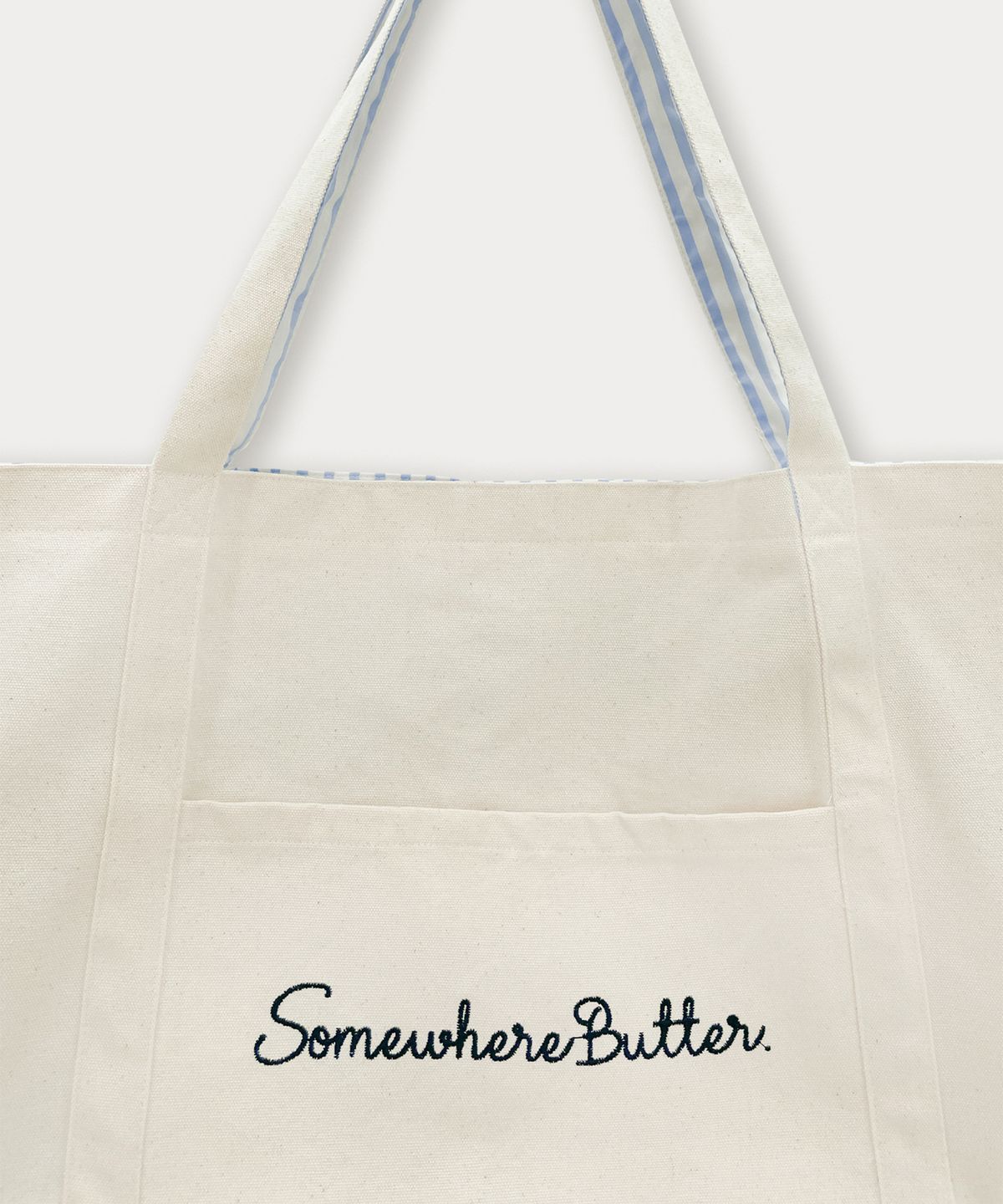 썸웨어버터(SOMEWHEREBUTTER) Letter Reversible Bag - Ivory