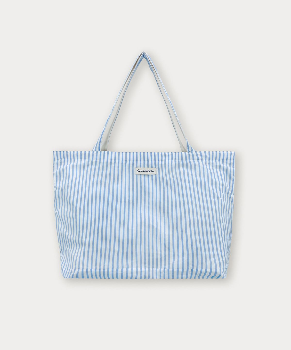 썸웨어버터(SOMEWHEREBUTTER) Letter Reversible Bag - Ivory