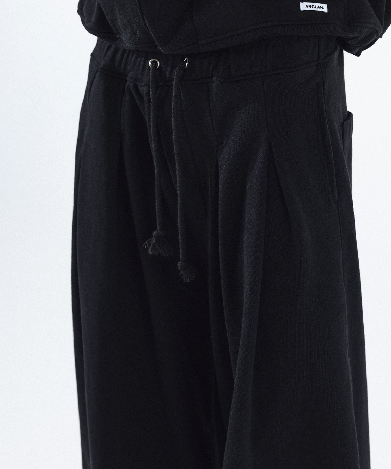 MUSINSA | ANGLAN Double Valley Tuck Sweat Pants - Black