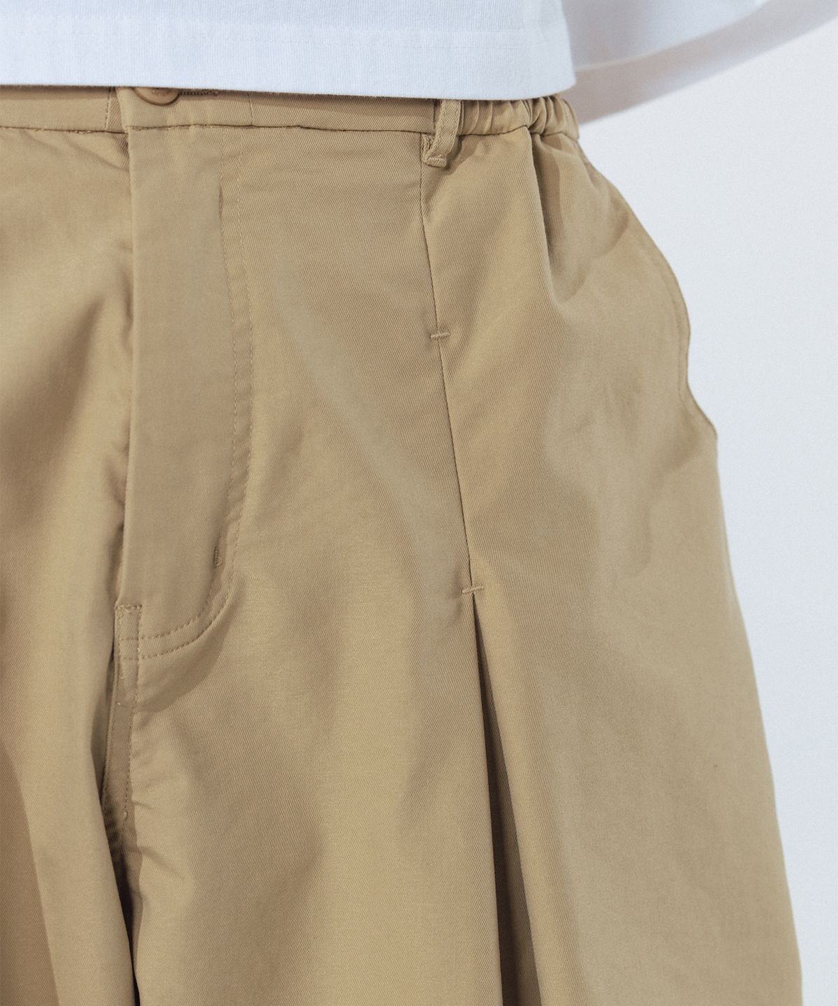 앵글런(ANGLAN) Unbalance Long Tuck Balloon Pants - Beige