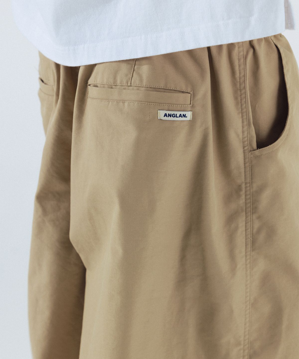 앵글런(ANGLAN) Unbalance Long Tuck Balloon Pants - Beige
