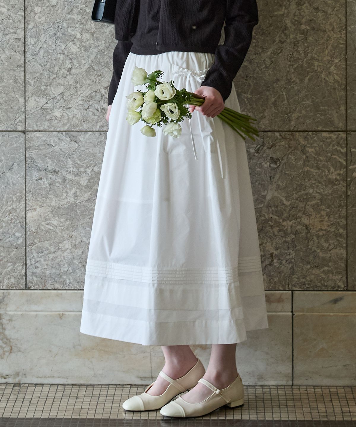 튜드먼트(TTUDEMENT) PINTUCK FLARE SKIRT IVORY