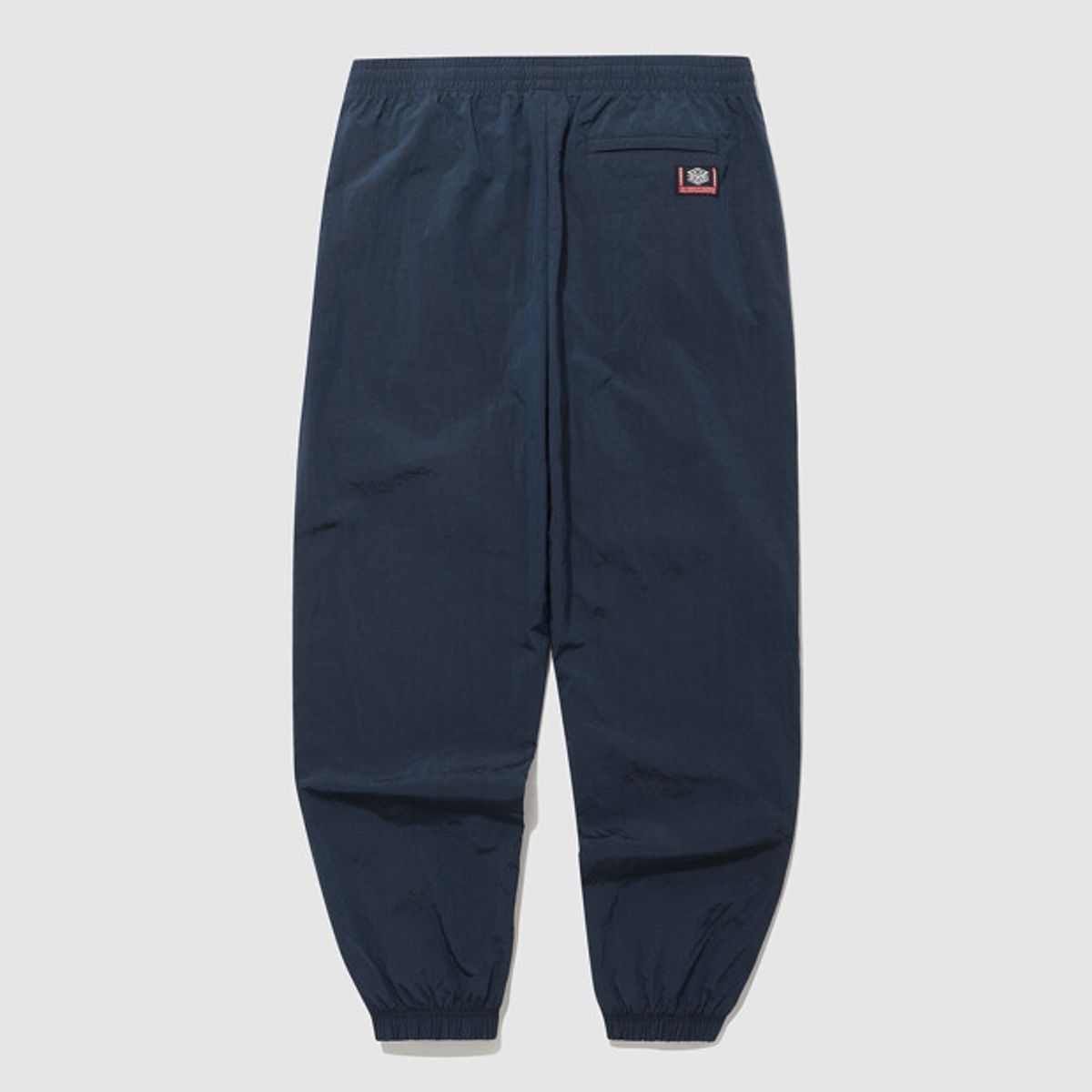 엄브로(UMBRO) HBL 노팅엄 우븐 조거 팬츠 네이비(UQ121CPT22)