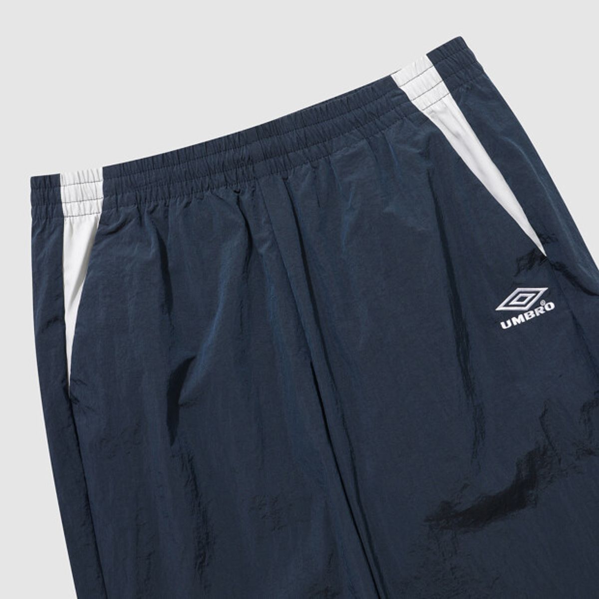 엄브로(UMBRO) HBL 노팅엄 우븐 조거 팬츠 네이비(UQ121CPT22)