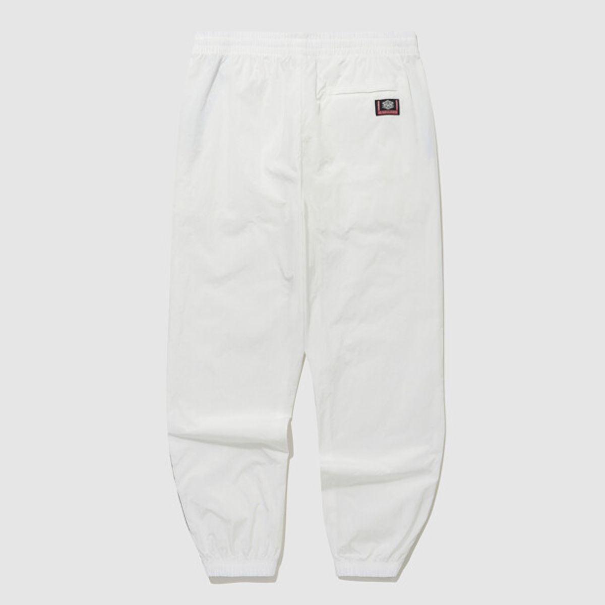 엄브로(UMBRO) HBL 노팅엄 우븐 조거 팬츠 아이보리(UQ121CPT22)