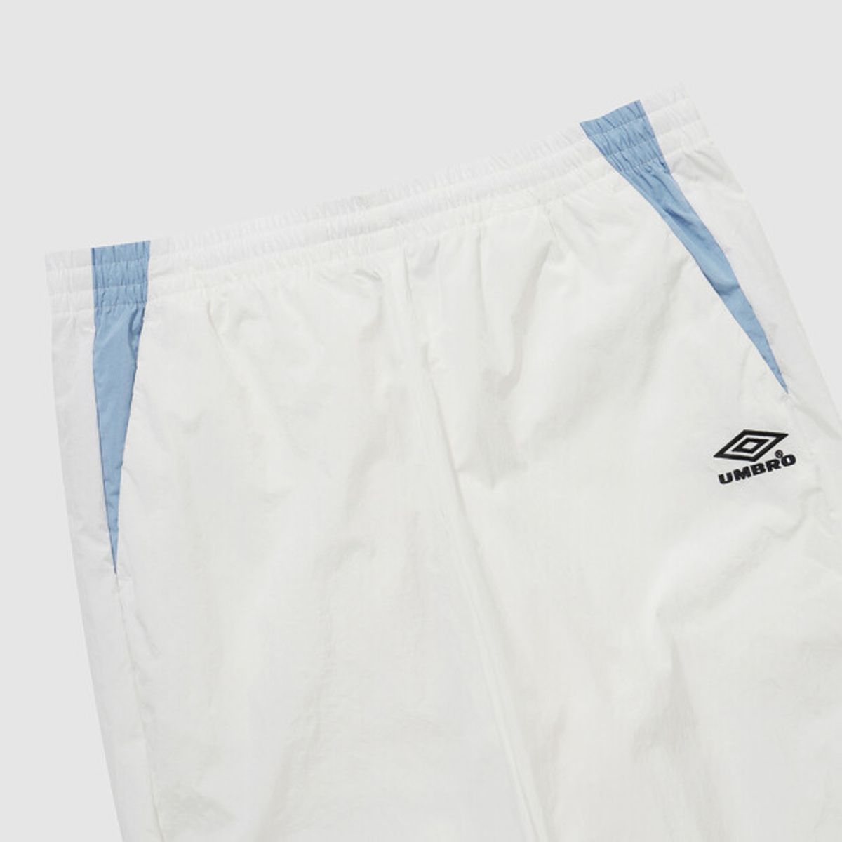 엄브로(UMBRO) HBL 노팅엄 우븐 조거 팬츠 아이보리(UQ121CPT22)