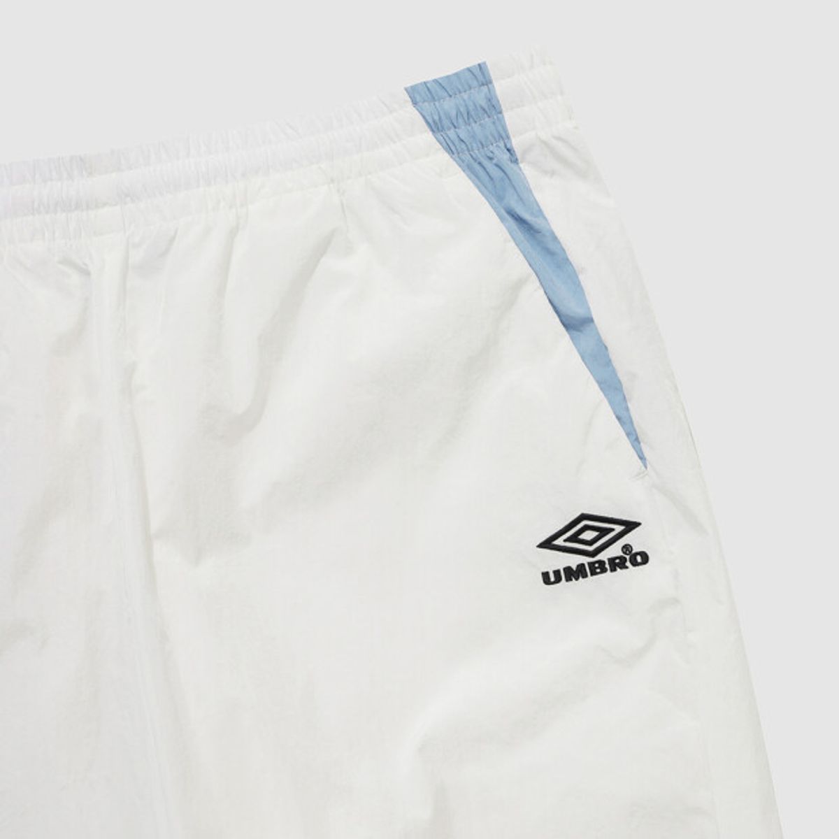 엄브로(UMBRO) HBL 노팅엄 우븐 조거 팬츠 아이보리(UQ121CPT22)