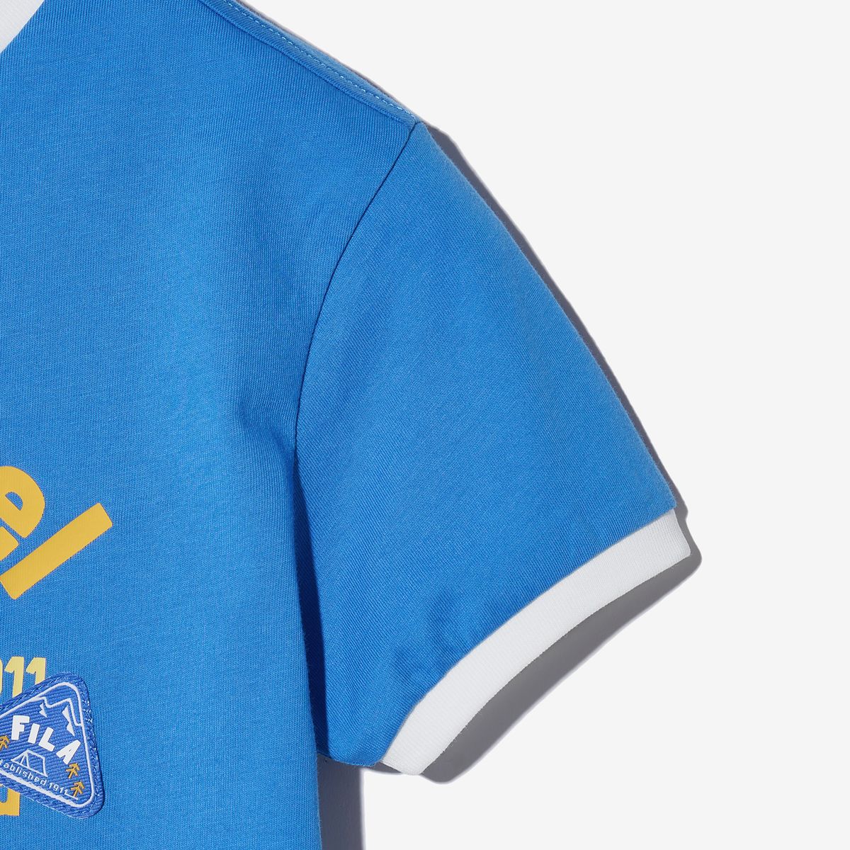 휠라 키즈(FILA KIDS) Travel club 링거 반팔티셔츠