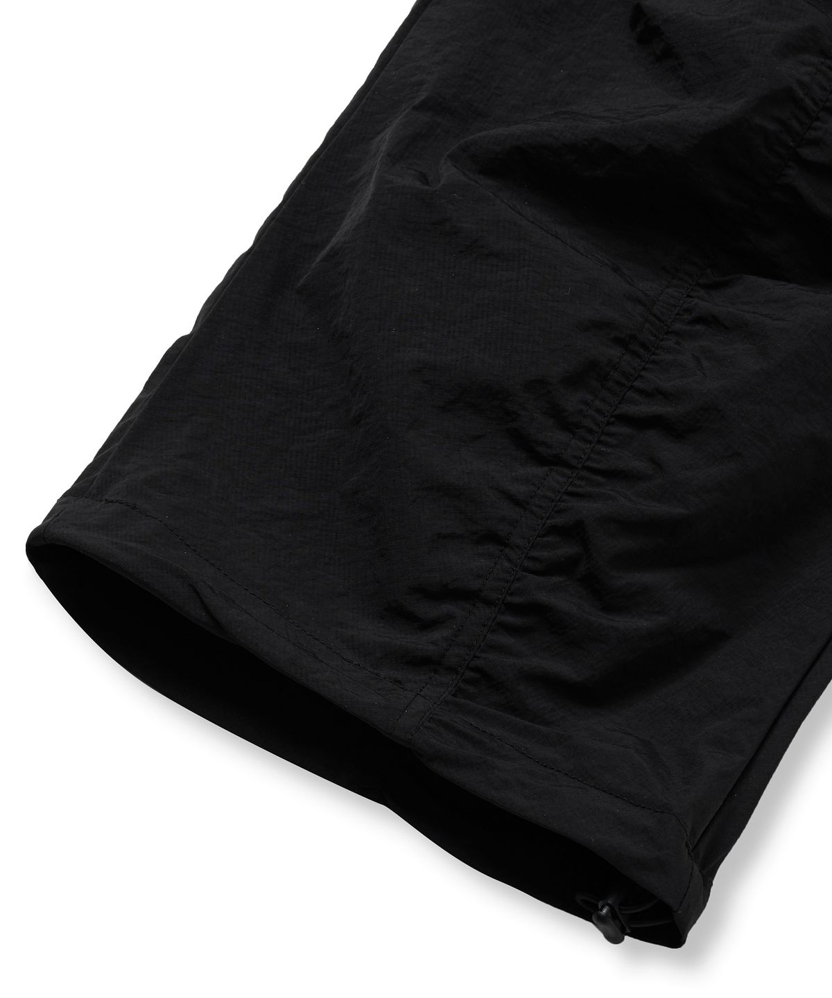 브라운브레스(BROWNBREATH) TAG NYLON SHIRRING PANTS - BLACK