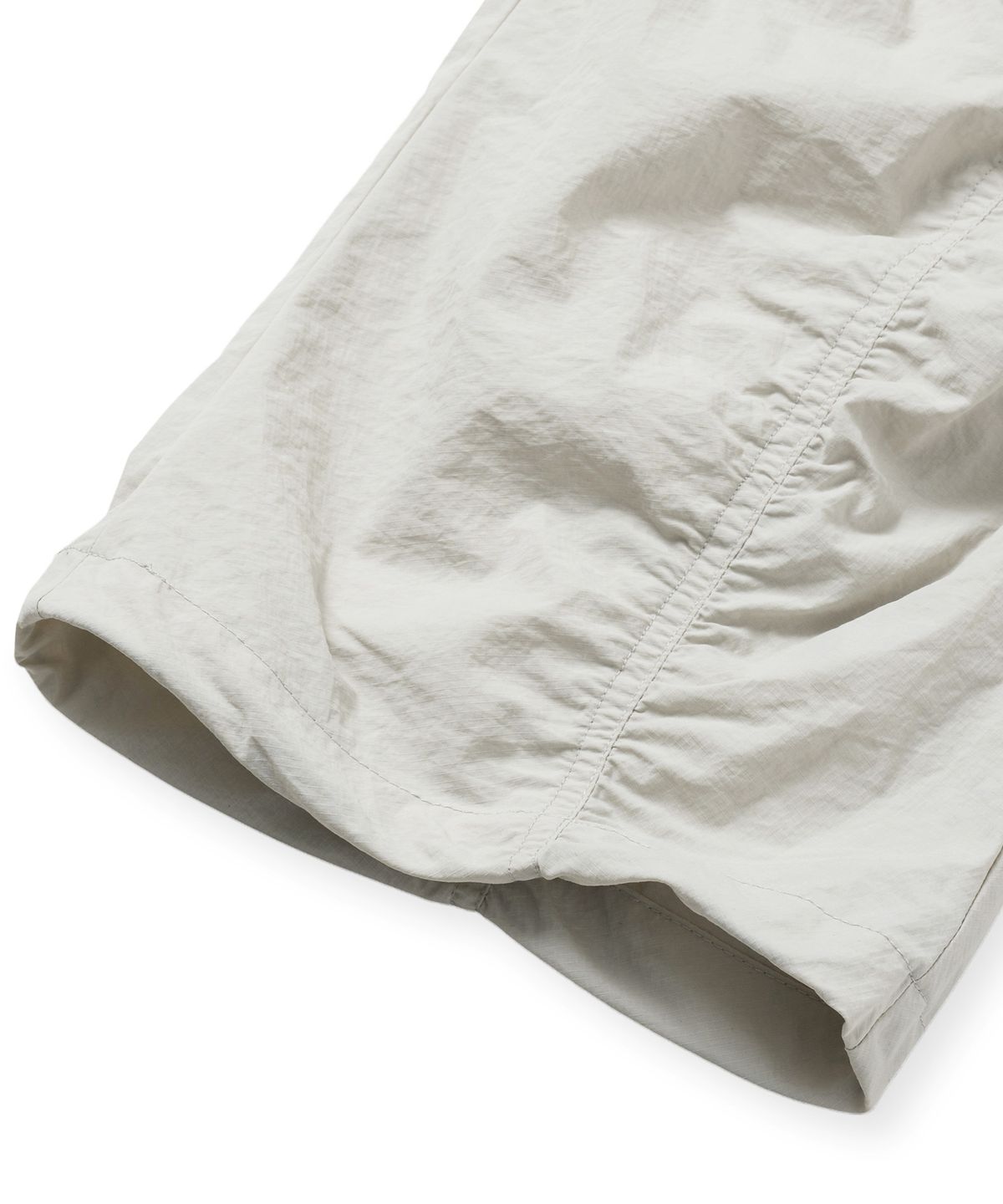 브라운브레스(BROWNBREATH) TAG NYLON SHIRRING PANTS - BEIGE