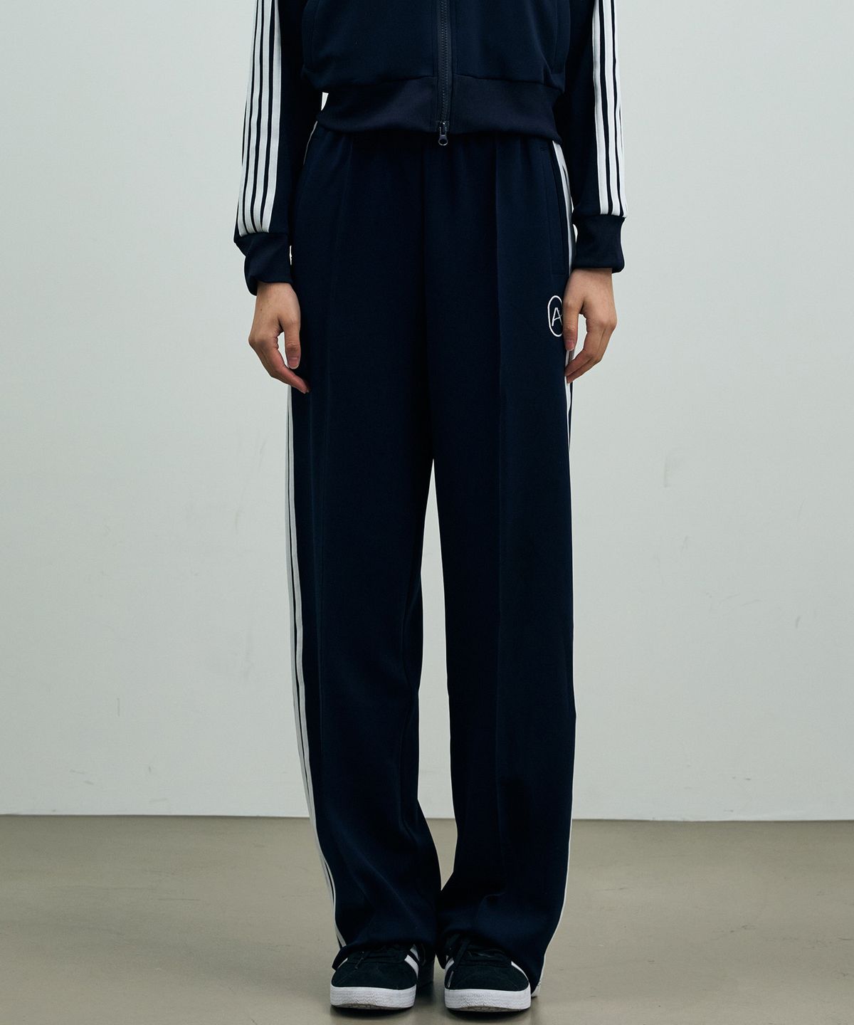 아리킴(ARIKIM) RIBBON JERSEY TRACK PANTS /NAVY