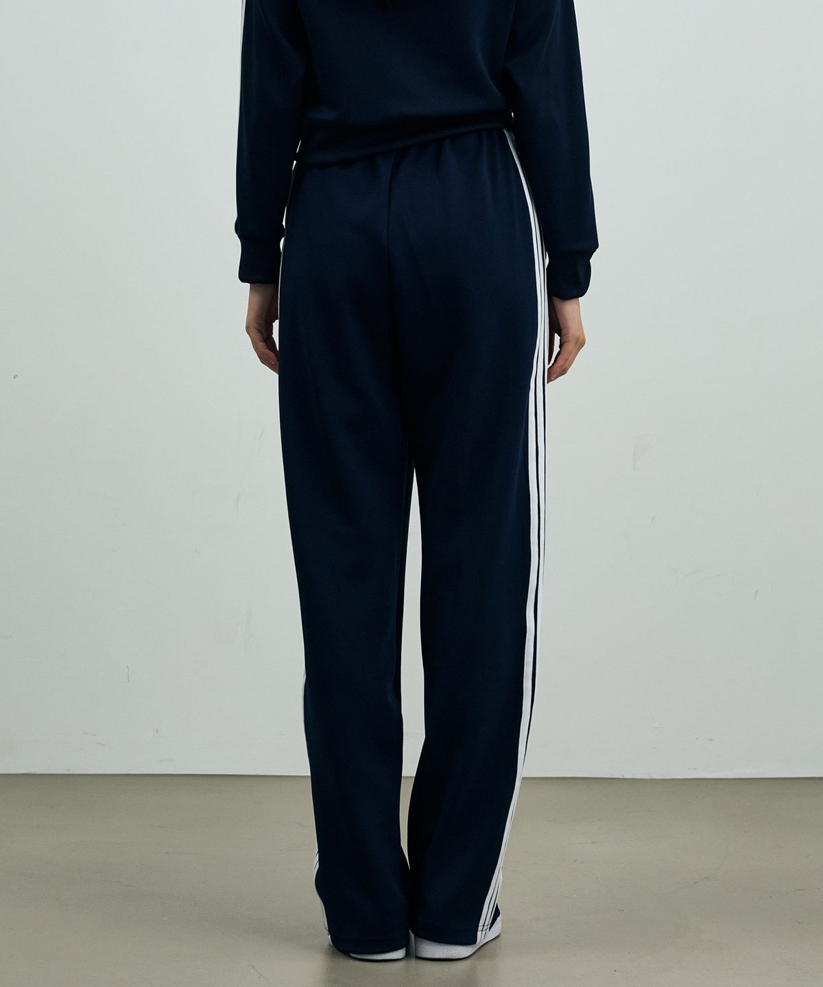 아리킴(ARIKIM) RIBBON JERSEY TRACK PANTS /NAVY