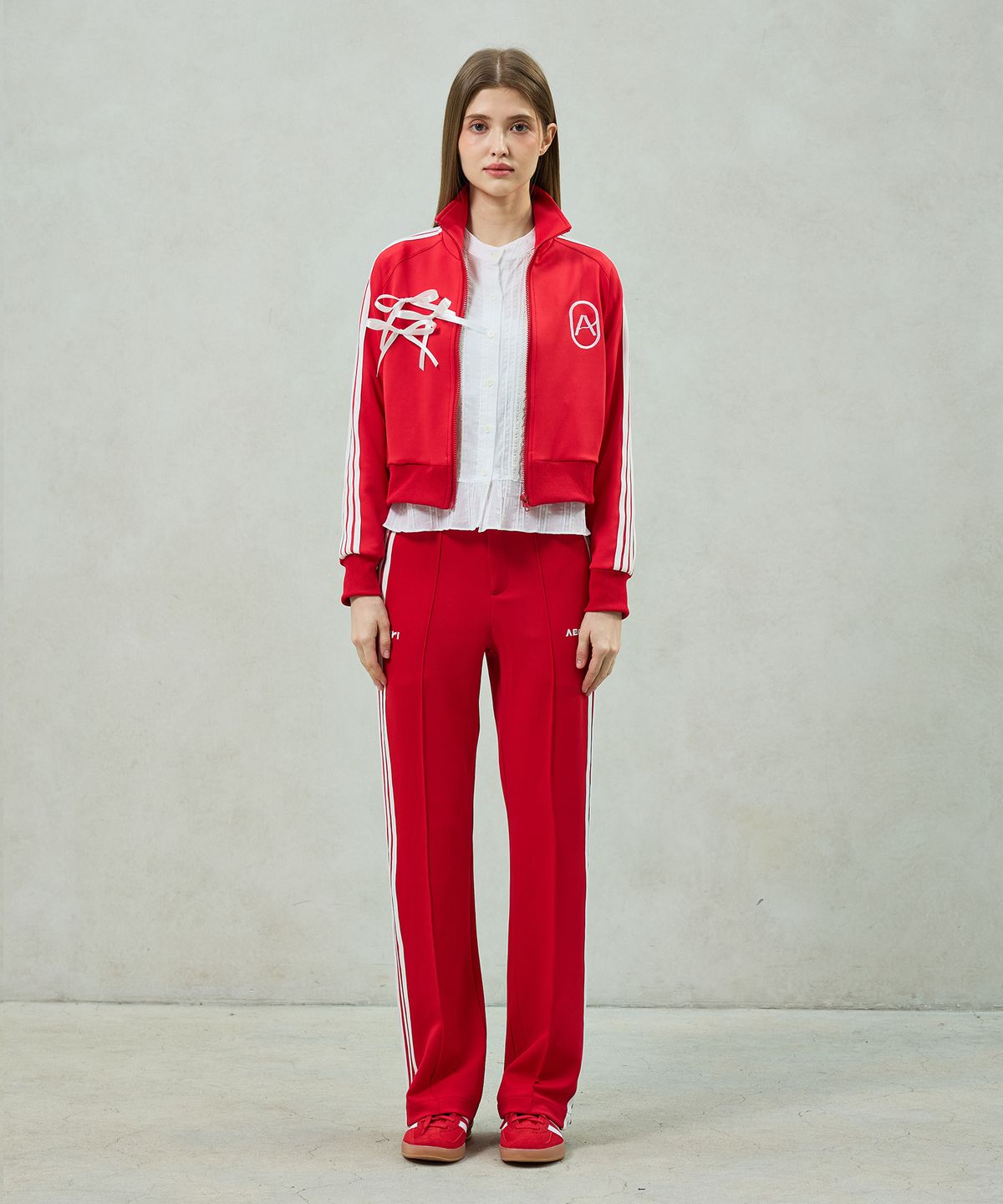 아리킴(ARIKIM) JOEL JERSEY TRACK PANTS / RED