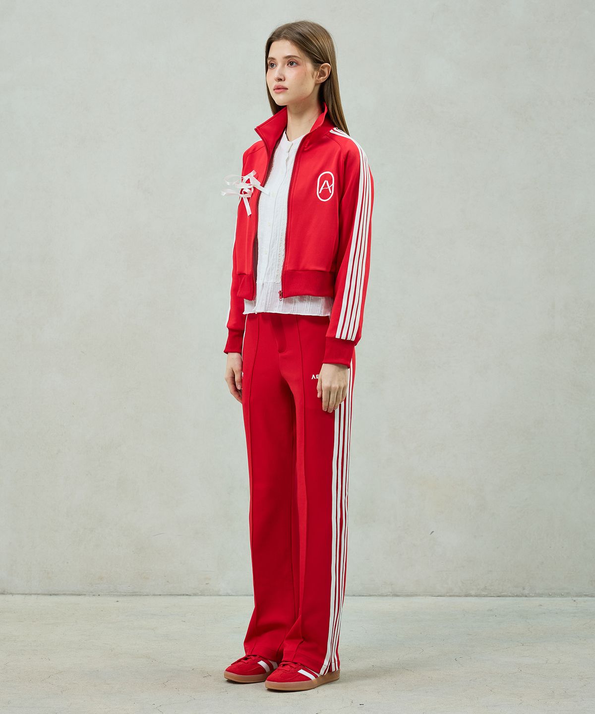 아리킴(ARIKIM) JOEL JERSEY TRACK PANTS / RED