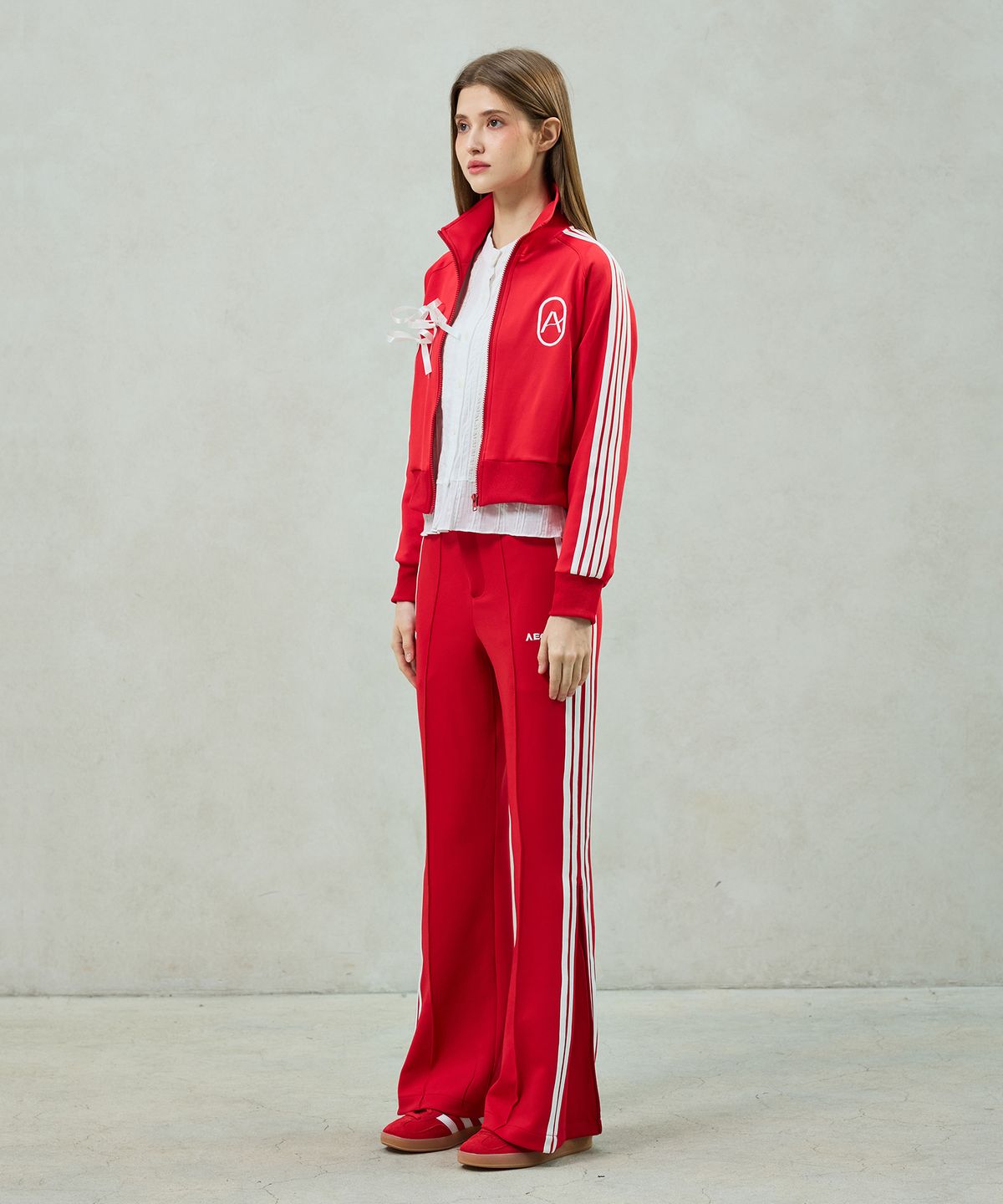 아리킴(ARIKIM) JOEL JERSEY TRACK PANTS / RED