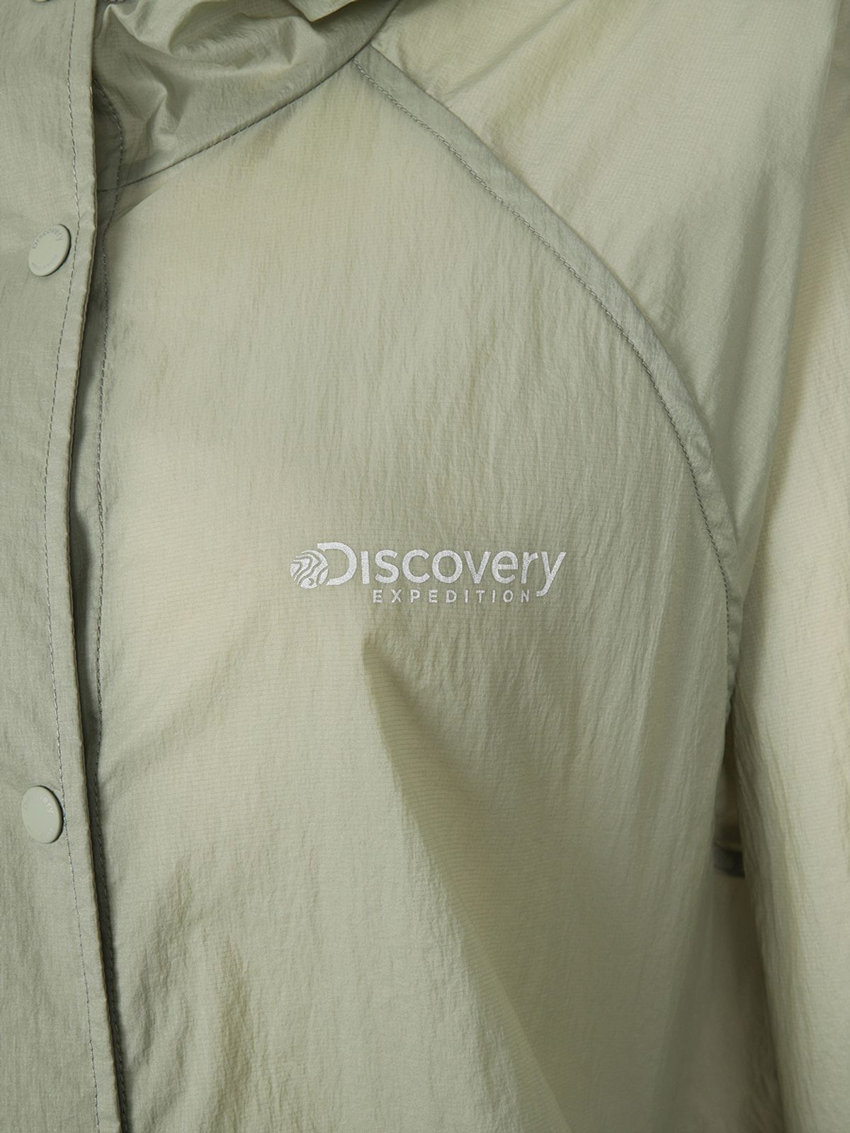 디스커버리 익스페디션(DISCOVERY EXPEDITION) 프레시벤트 여성 오버핏 바람막이 (N/KHAKI)