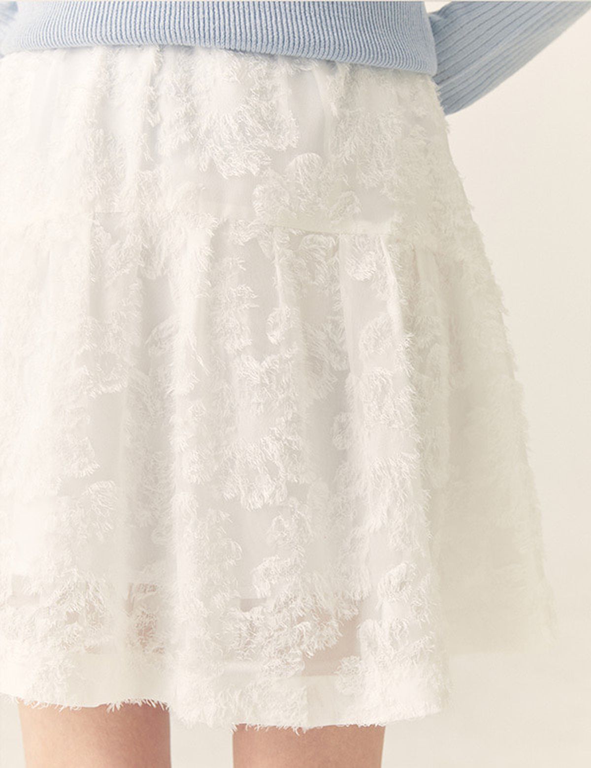 로엠(ROEM) 소재변형 미니 스커트_RMWHF23R12