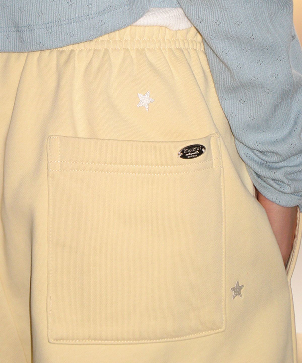 론론(RONRON) STAR EMBROIDERY SWEAT JOGGER PANTS CREAM YELLOW