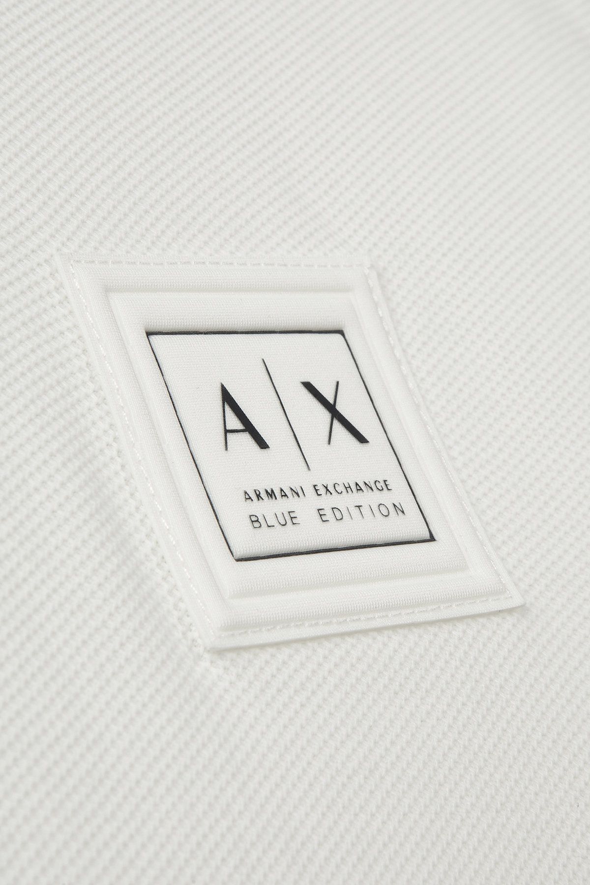 아르마니 익스체인지(ARMANI EXCHANGE) 남성 로고 패치 코튼 폴로 셔츠_화이트 A415131019