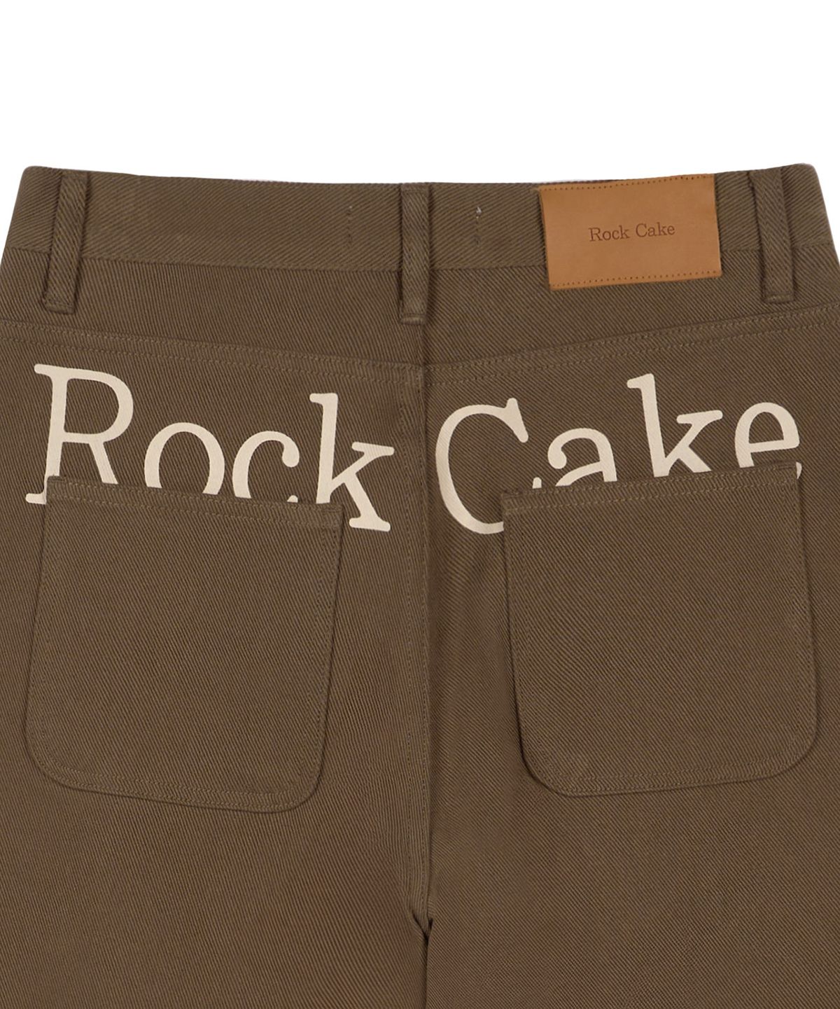 락케이크(ROCKCAKE) Lettering Hide Pants - Brown