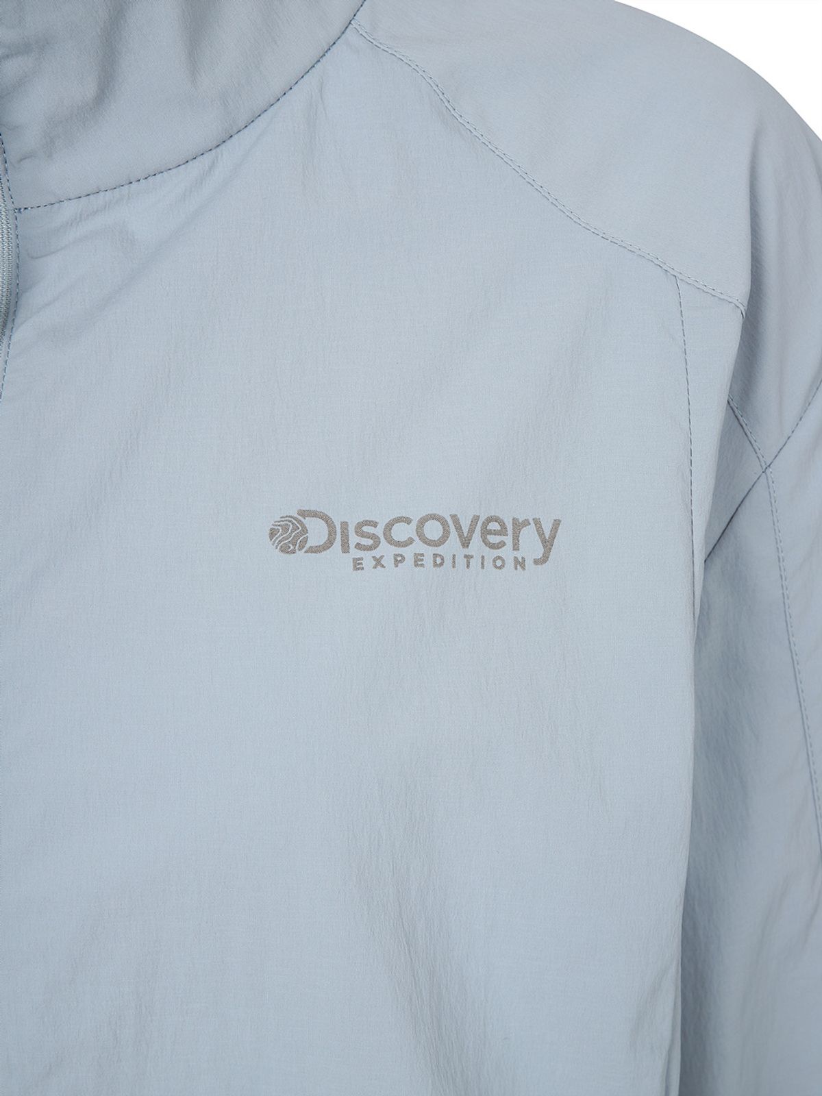 디스커버리 익스페디션(DISCOVERY EXPEDITION) 프레시벤트 여성 폴튼 경량 세미오버핏 트레이닝 자켓 (L. SKY BLUE)